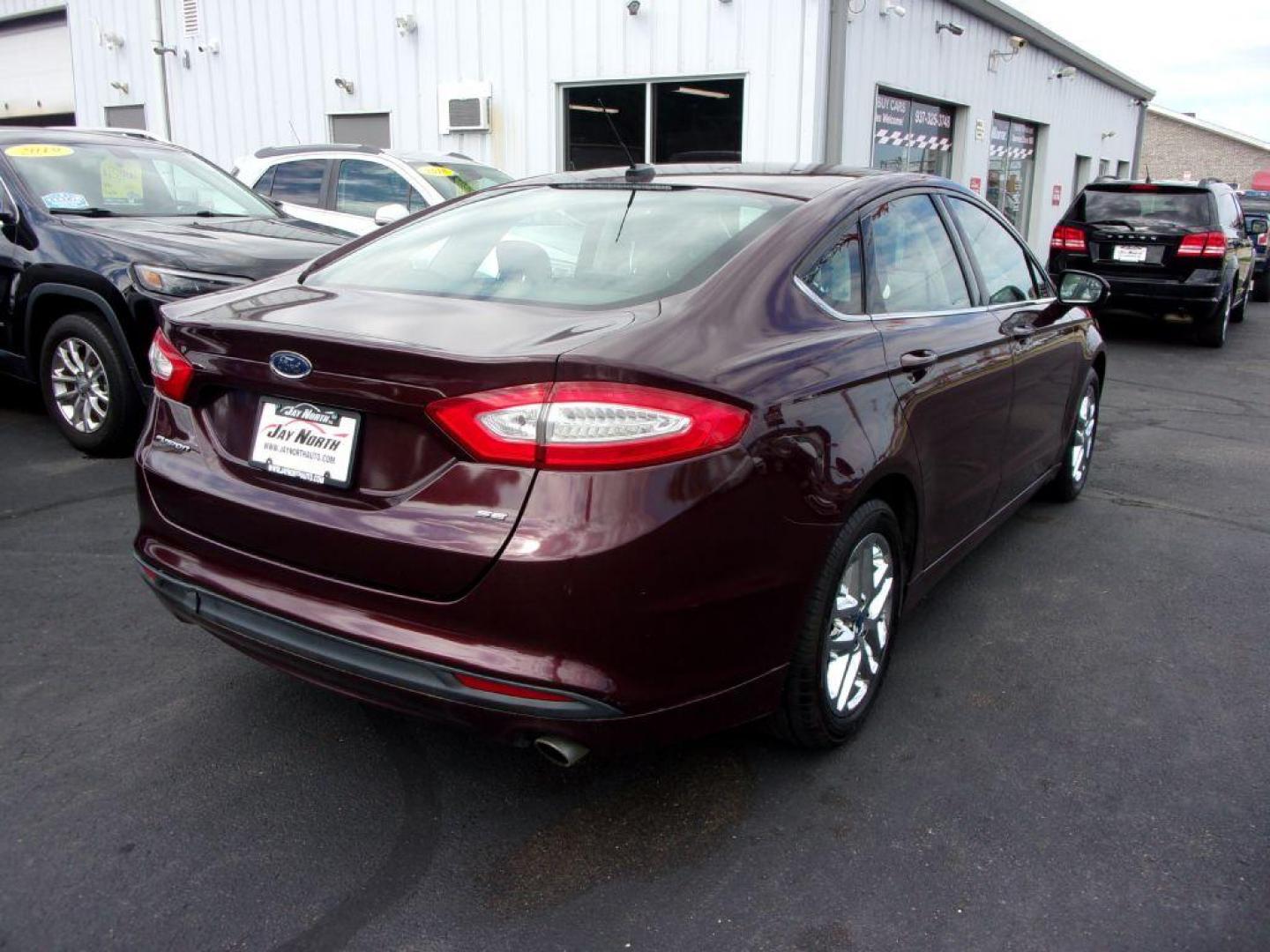 2013 RED FORD FUSION SE (3FA6P0H77DR) with an 2.5L engine, Automatic transmission, located at 501 E. Columbia St., Springfield, OH, 45503, (800) 262-7122, 39.925262, -83.801796 - ***Clean Carfax***New Front and Rear Pads and Rotors***New Suspention Parts***SE***2.5L***Serviced and Detailed*** - Photo#3
