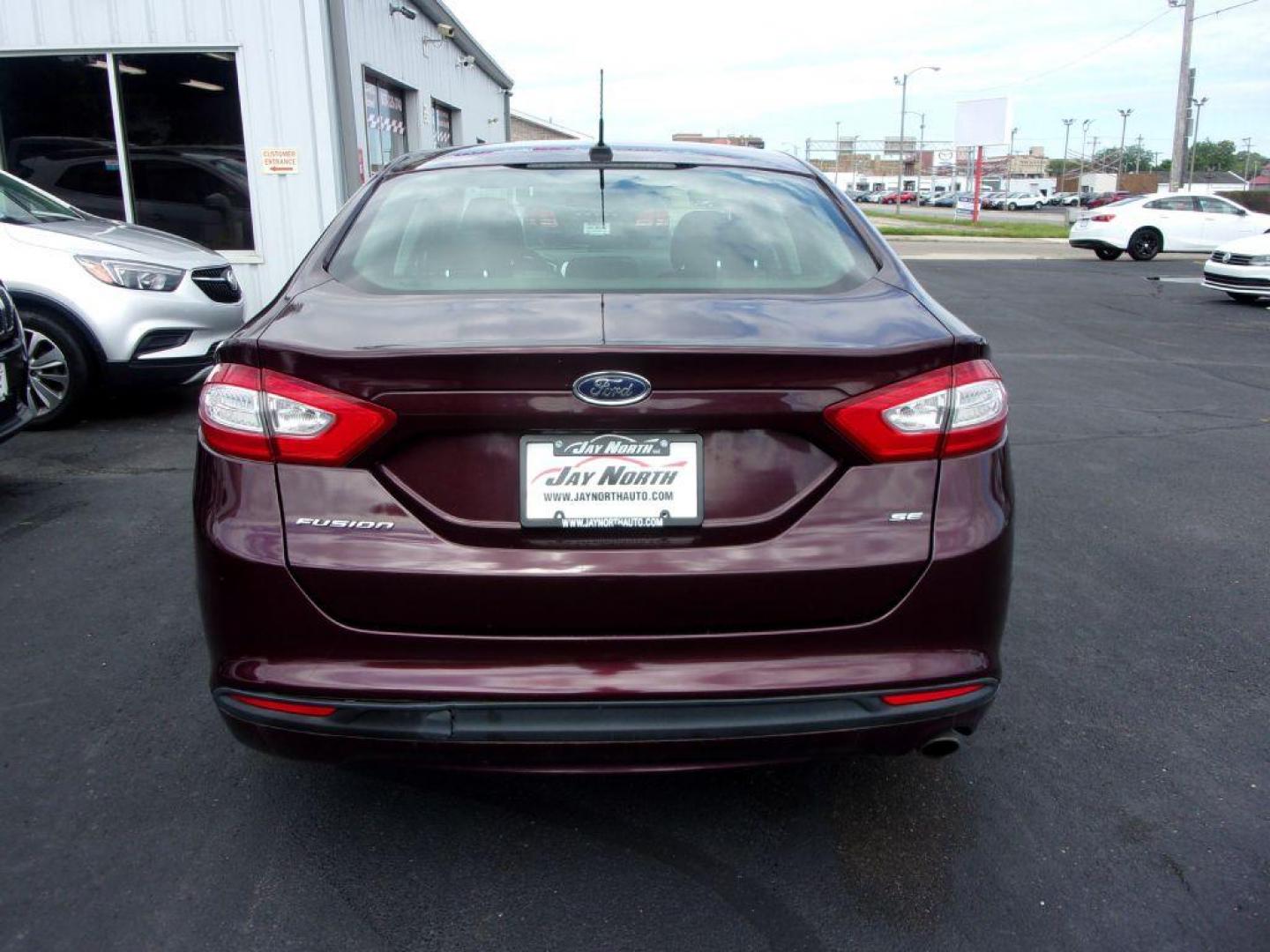 2013 RED FORD FUSION SE (3FA6P0H77DR) with an 2.5L engine, Automatic transmission, located at 501 E. Columbia St., Springfield, OH, 45503, (800) 262-7122, 39.925262, -83.801796 - ***Clean Carfax***New Front and Rear Pads and Rotors***New Suspention Parts***SE***2.5L***Serviced and Detailed*** - Photo#4