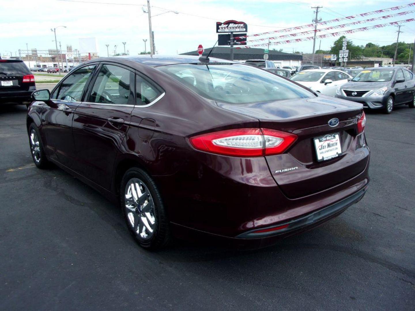 2013 RED FORD FUSION SE (3FA6P0H77DR) with an 2.5L engine, Automatic transmission, located at 501 E. Columbia St., Springfield, OH, 45503, (800) 262-7122, 39.925262, -83.801796 - ***Clean Carfax***New Front and Rear Pads and Rotors***New Suspention Parts***SE***2.5L***Serviced and Detailed*** - Photo#5
