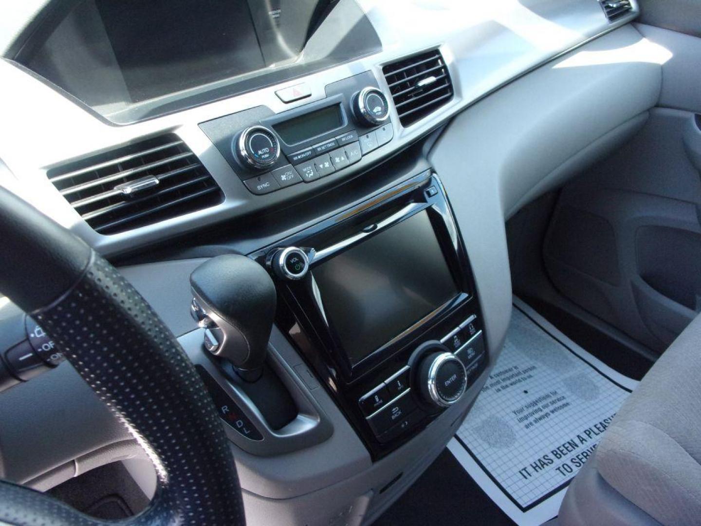2016 GRAY HONDA ODYSSEY SE (5FNRL5H3XGB) with an 3.5L engine, Automatic transmission, located at 501 E. Columbia St., Springfield, OH, 45503, (800) 262-7122, 39.925262, -83.801796 - *** New Timing Belt w/ water pump and pulleys *** Transmission Serviced *** Coolant Serviced *** New Front and Rear Brakes *** New Tires *** Tune Up *** Jay North Auto has offered hand picked vehicles since 1965! Our customer's enjoy a NO pressure buying experience with a small town feel. All o - Photo#16