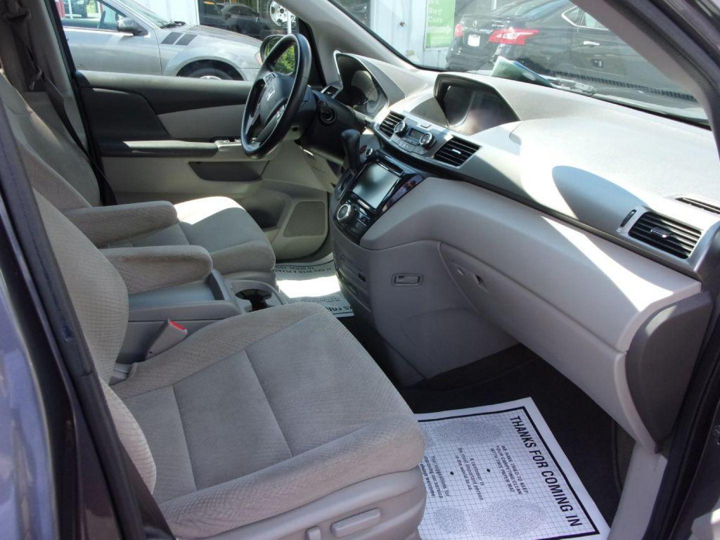 2016 GRAY HONDA ODYSSEY SE (5FNRL5H3XGB) with an 3.5L engine, Automatic transmission, located at 501 E. Columbia St., Springfield, OH, 45503, (800) 262-7122, 39.925262, -83.801796 - *** New Timing Belt w/ water pump and pulleys *** Transmission Serviced *** Coolant Serviced *** New Front and Rear Brakes *** New Tires *** Tune Up *** Jay North Auto has offered hand picked vehicles since 1965! Our customer's enjoy a NO pressure buying experience with a small town feel. All o - Photo#19