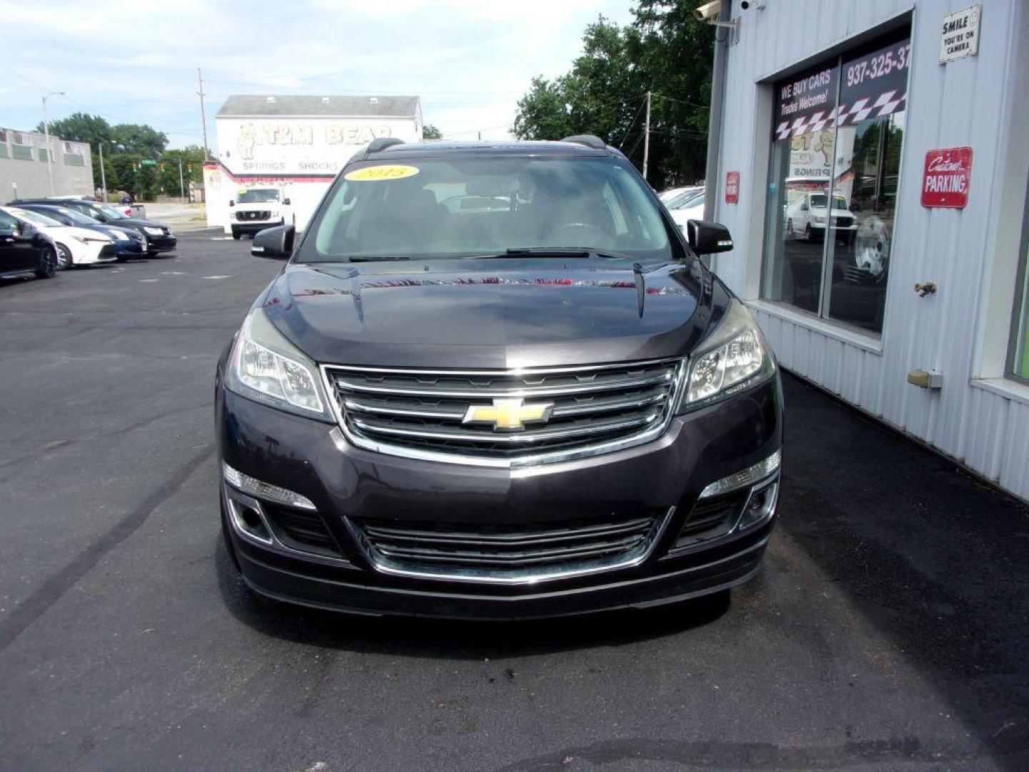 2015 GRAY CHEVROLET TRAVERSE LT (1GNKRGKD1FJ) with an 3.6L engine, Automatic transmission, located at 501 E. Columbia St., Springfield, OH, 45503, (800) 262-7122, 39.925262, -83.801796 - ***LT***Heated Seats***Remote Start***Captians Chairs***3rd Row Seating***New Tires***Serviced and Detailed*** Jay North Auto has offered hand picked vehicles since 1965! Our customer's enjoy a NO pressure buying experience with a small town feel. All of our vehicles get fully inspected and deta - Photo#1