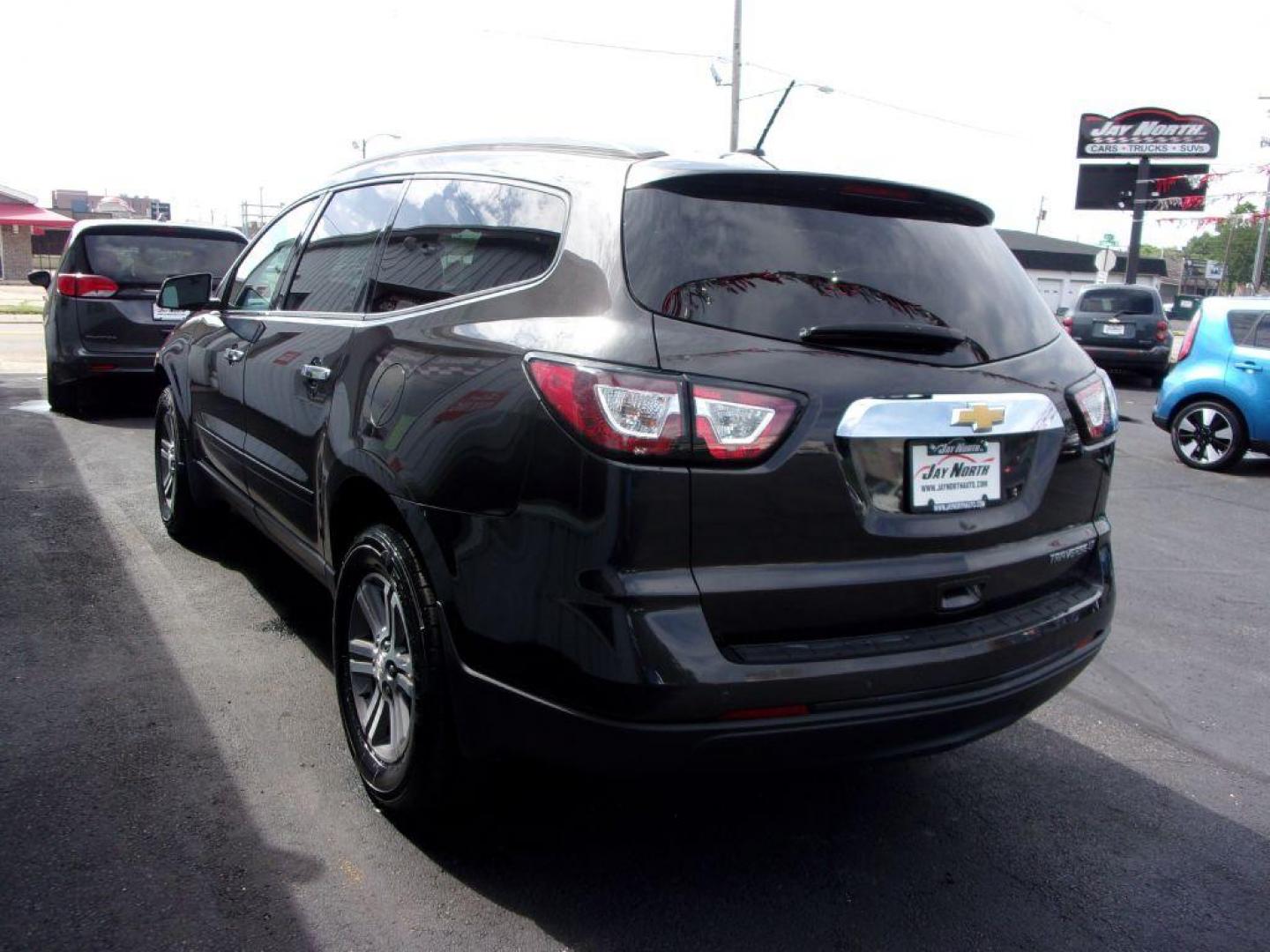 2015 GRAY CHEVROLET TRAVERSE LT (1GNKRGKD1FJ) with an 3.6L engine, Automatic transmission, located at 501 E. Columbia St., Springfield, OH, 45503, (800) 262-7122, 39.925262, -83.801796 - ***LT***Heated Seats***Remote Start***Captians Chairs***3rd Row Seating***New Tires***Serviced and Detailed*** Jay North Auto has offered hand picked vehicles since 1965! Our customer's enjoy a NO pressure buying experience with a small town feel. All of our vehicles get fully inspected and deta - Photo#5