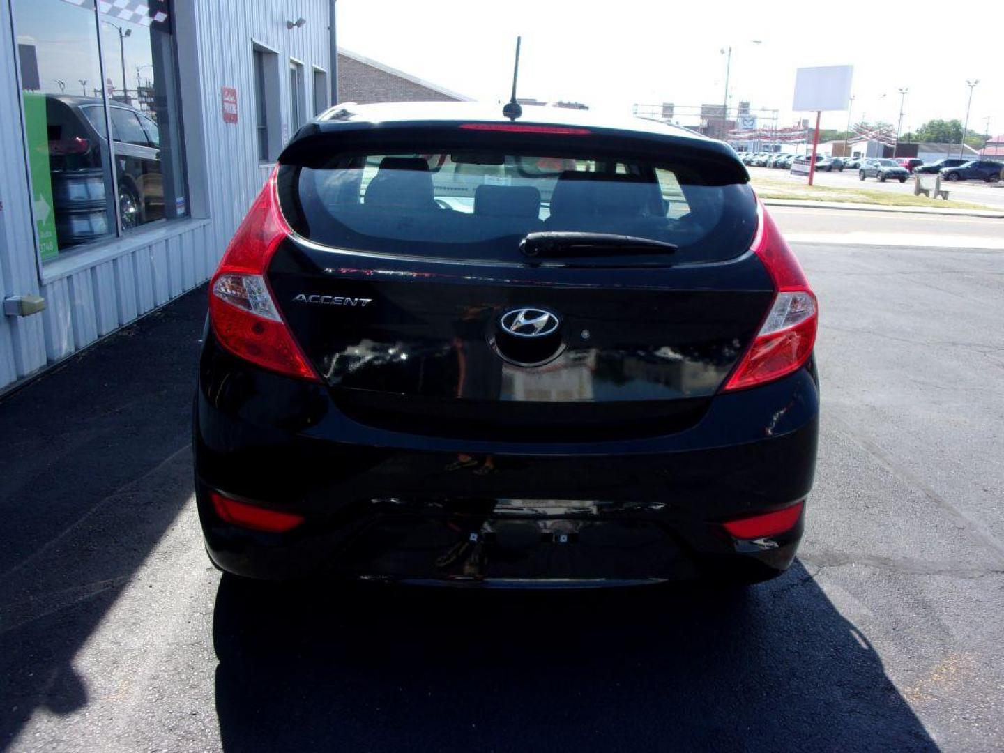 2015 BLACK HYUNDAI ACCENT SPORT (KMHCU5AE5FU) with an 1.6L engine, Automatic transmission, located at 501 E. Columbia St., Springfield, OH, 45503, (800) 262-7122, 39.925262, -83.801796 - ***SPORT***New Tires***Sunroof***Serviced and Detailed*** Jay North Auto has offered hand picked vehicles since 1965! Our customer's enjoy a NO pressure buying experience with a small town feel. All of our vehicles get fully inspected and detailed. We are a preferred dealer for many local credit - Photo#4