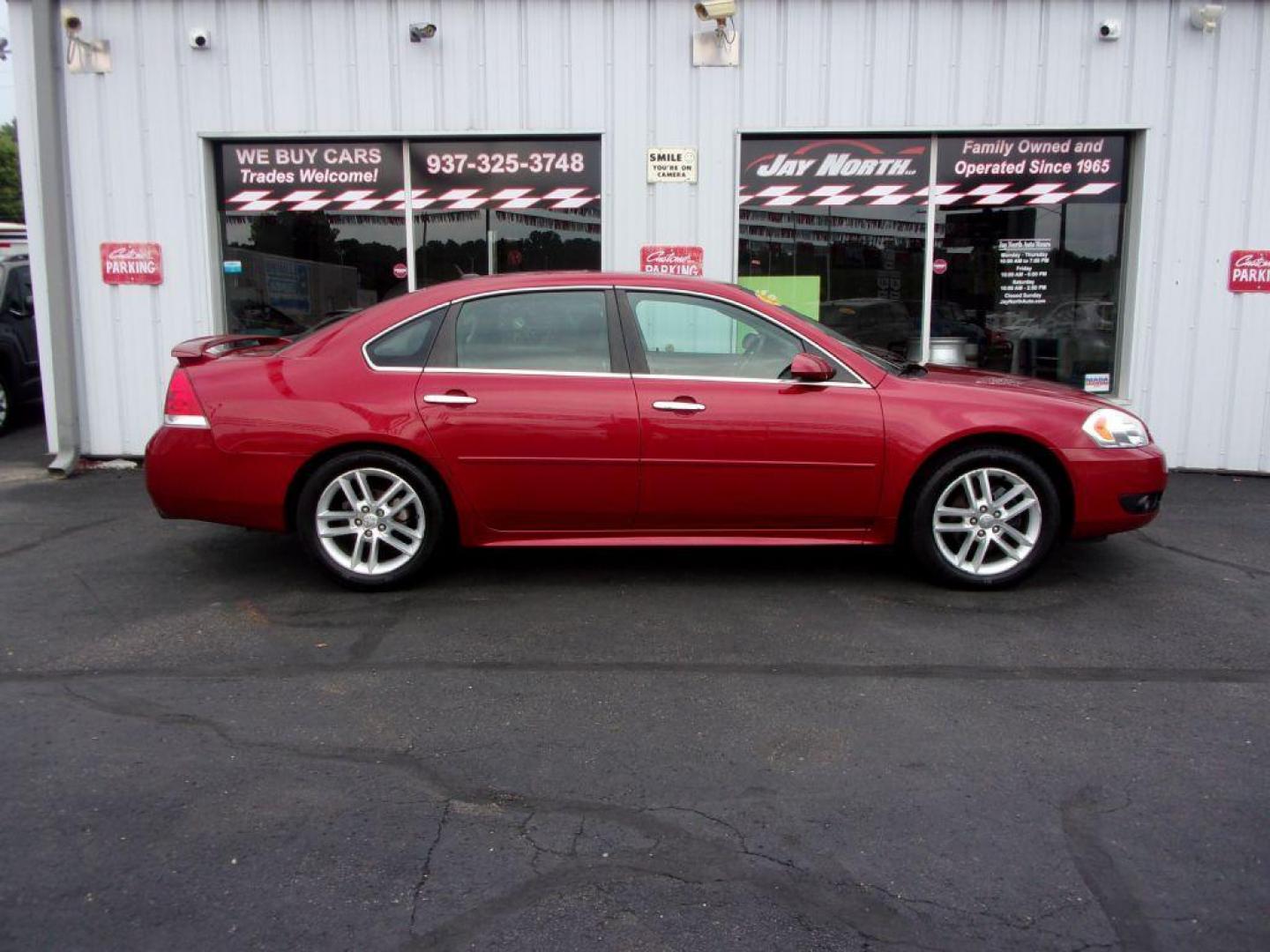 2012 RED CHEVROLET IMPALA LTZ (2G1WC5E38C1) with an 3.6L engine, Automatic transmission, located at 501 E. Columbia St., Springfield, OH, 45503, (800) 262-7122, 39.925262, -83.801796 - Photo#0