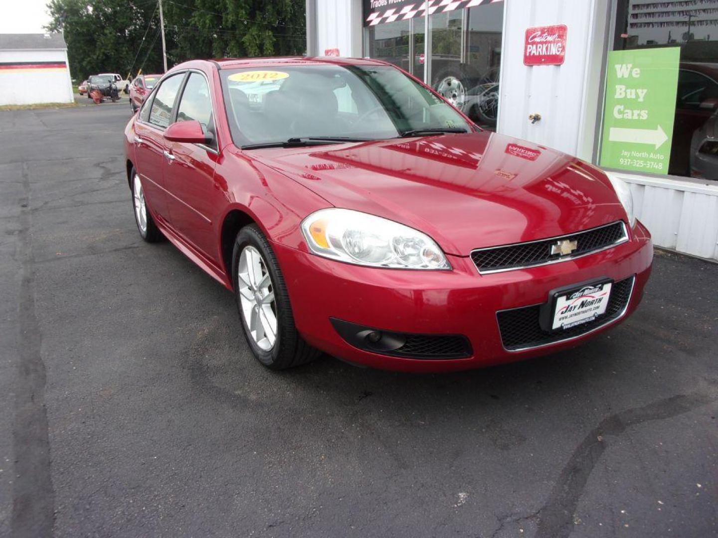 2012 RED CHEVROLET IMPALA LTZ (2G1WC5E38C1) with an 3.6L engine, Automatic transmission, located at 501 E. Columbia St., Springfield, OH, 45503, (800) 262-7122, 39.925262, -83.801796 - Photo#2