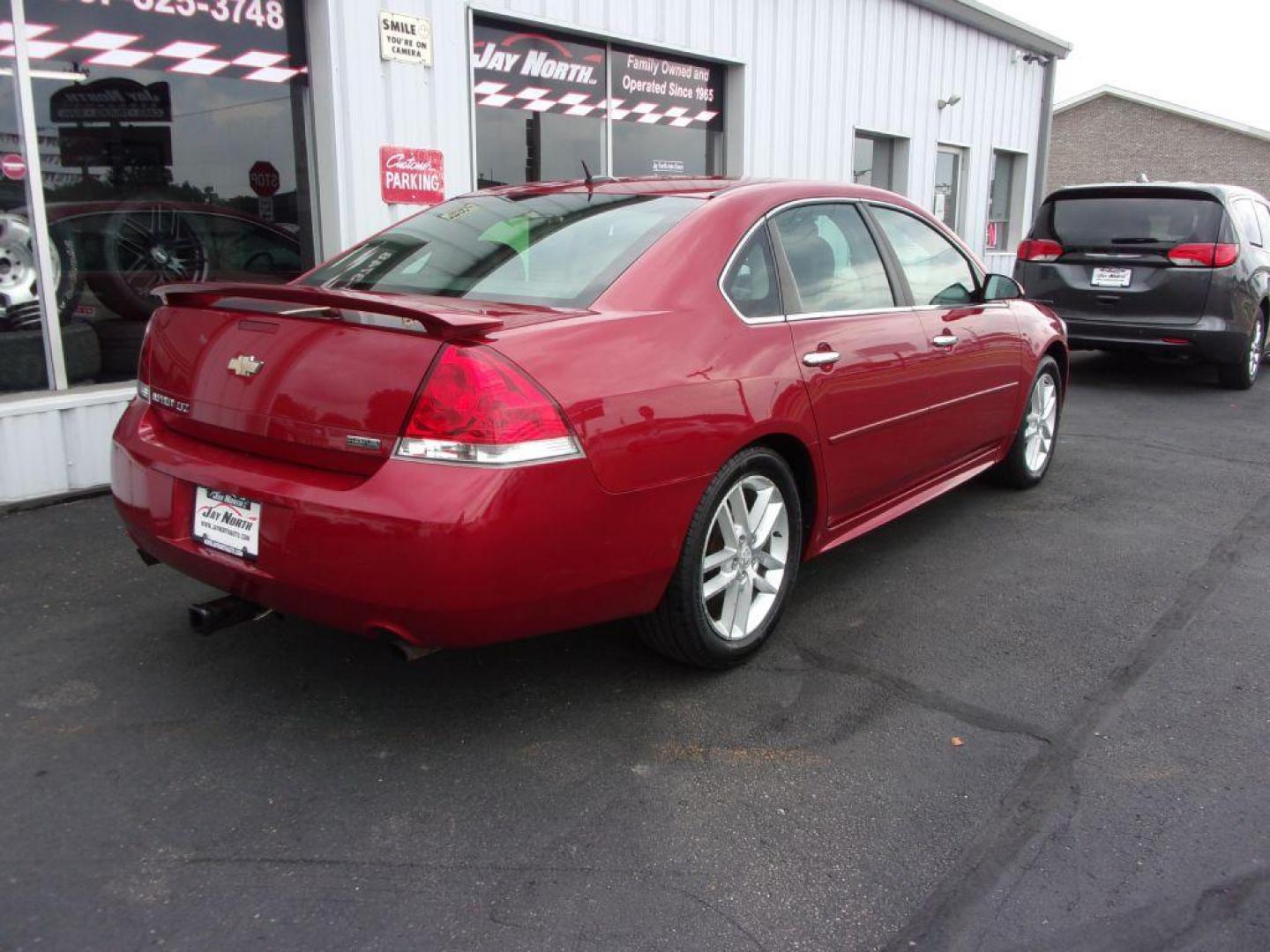 2012 RED CHEVROLET IMPALA LTZ (2G1WC5E38C1) with an 3.6L engine, Automatic transmission, located at 501 E. Columbia St., Springfield, OH, 45503, (800) 262-7122, 39.925262, -83.801796 - Photo#3