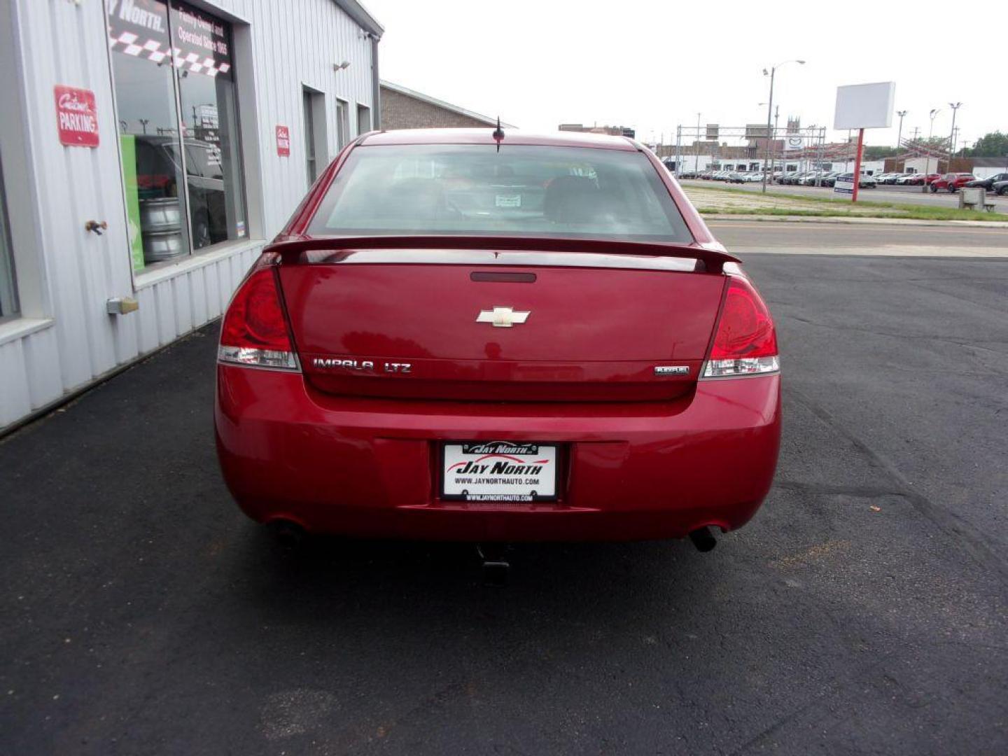 2012 RED CHEVROLET IMPALA LTZ (2G1WC5E38C1) with an 3.6L engine, Automatic transmission, located at 501 E. Columbia St., Springfield, OH, 45503, (800) 262-7122, 39.925262, -83.801796 - Photo#4