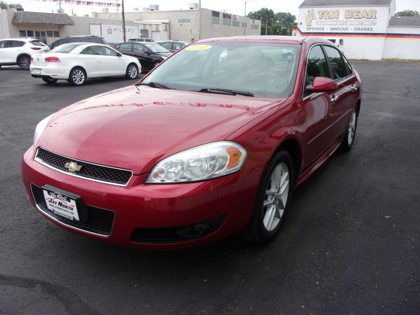 2012 RED CHEVROLET IMPALA LTZ (2G1WC5E38C1) with an 3.6L engine, Automatic transmission, located at 501 E. Columbia St., Springfield, OH, 45503, (800) 262-7122, 39.925262, -83.801796 - Photo#6