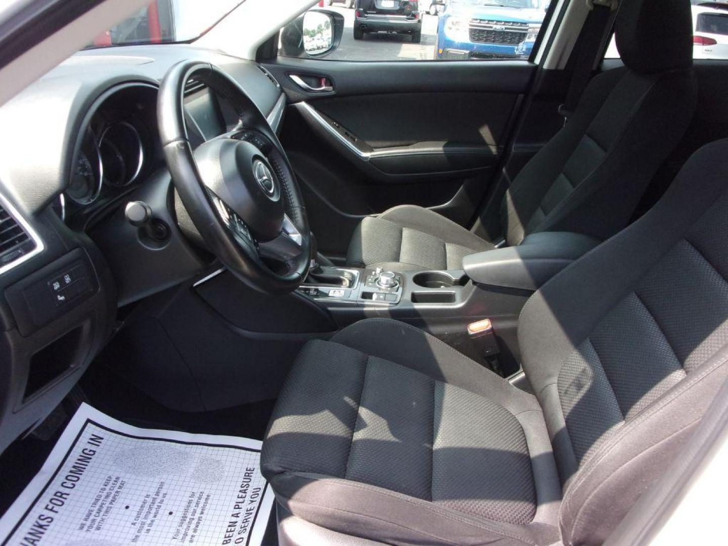 2016 WHITE MAZDA CX-5 TOURING (JM3KE4CY5G0) with an 2.5L engine, Automatic transmission, located at 501 E. Columbia St., Springfield, OH, 45503, (800) 262-7122, 39.925262, -83.801796 - *** New Tires *** Serviced and Detailed *** Moonroof *** Back Up Camera *** Touring *** AWD *** Jay North Auto has offered hand picked vehicles since 1965! Our customer's enjoy a NO pressure buying experience with a small town feel. All of our vehicles get fully inspected and detailed. We are a - Photo#8