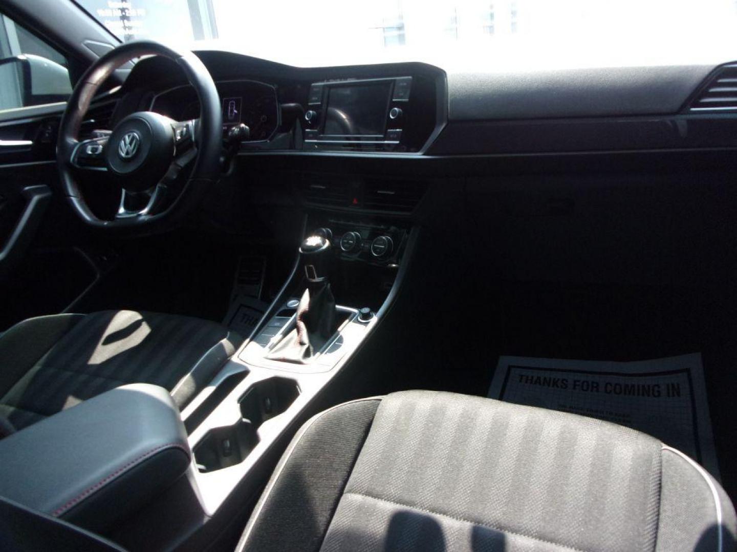 2019 WHITE VOLKSWAGEN JETTA GLI (3VW5T7BU8KM) with an 2.0L engine, 6-Speed Manual transmission, located at 501 E. Columbia St., Springfield, OH, 45503, (800) 262-7122, 39.925262, -83.801796 - *** GLI 6 - Speed Manual *** NICE!!! *** Serviced and Detailed *** Premium Audio *** Jay North Auto has offered hand picked vehicles since 1965! Our customer's enjoy a NO pressure buying experience with a small town feel. All of our vehicles get fully inspected and detailed. We are a preferred - Photo#20