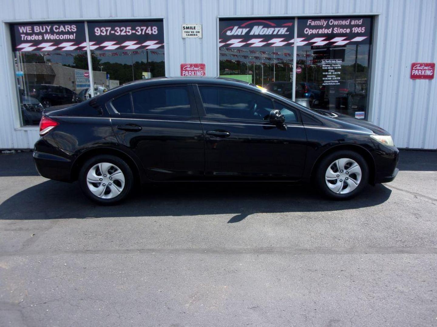 2015 BLACK HONDA CIVIC LX (19XFB2E55FE) with an 1.8L engine, 5-Speed Manual transmission, located at 501 E. Columbia St., Springfield, OH, 45503, (800) 262-7122, 39.925262, -83.801796 - Photo#0