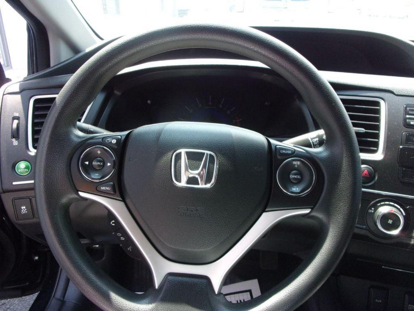 2015 BLACK HONDA CIVIC LX (19XFB2E55FE) with an 1.8L engine, 5-Speed Manual transmission, located at 501 E. Columbia St., Springfield, OH, 45503, (800) 262-7122, 39.925262, -83.801796 - Photo#9
