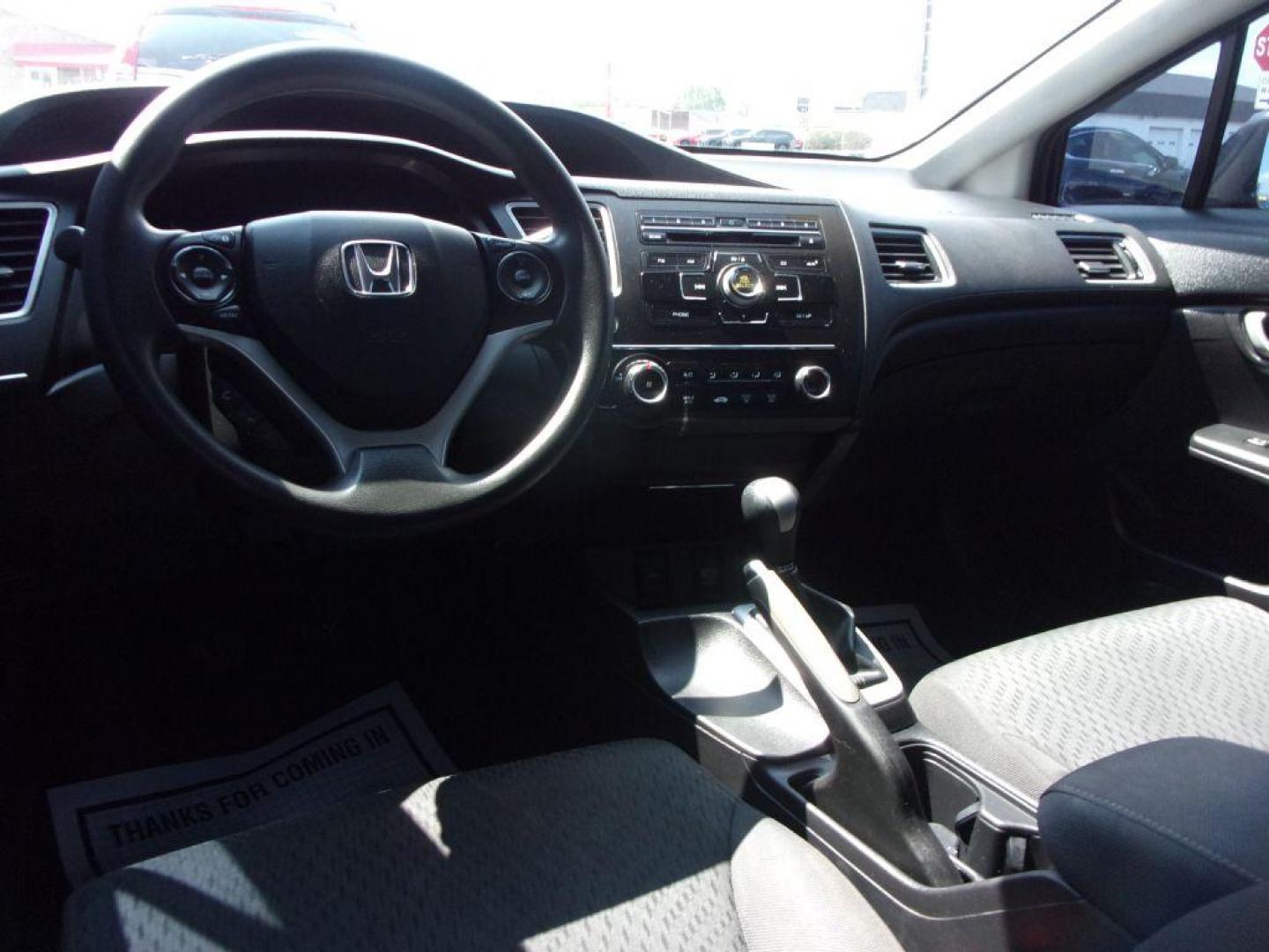 2015 BLACK HONDA CIVIC LX (19XFB2E55FE) with an 1.8L engine, 5-Speed Manual transmission, located at 501 E. Columbia St., Springfield, OH, 45503, (800) 262-7122, 39.925262, -83.801796 - Photo#11