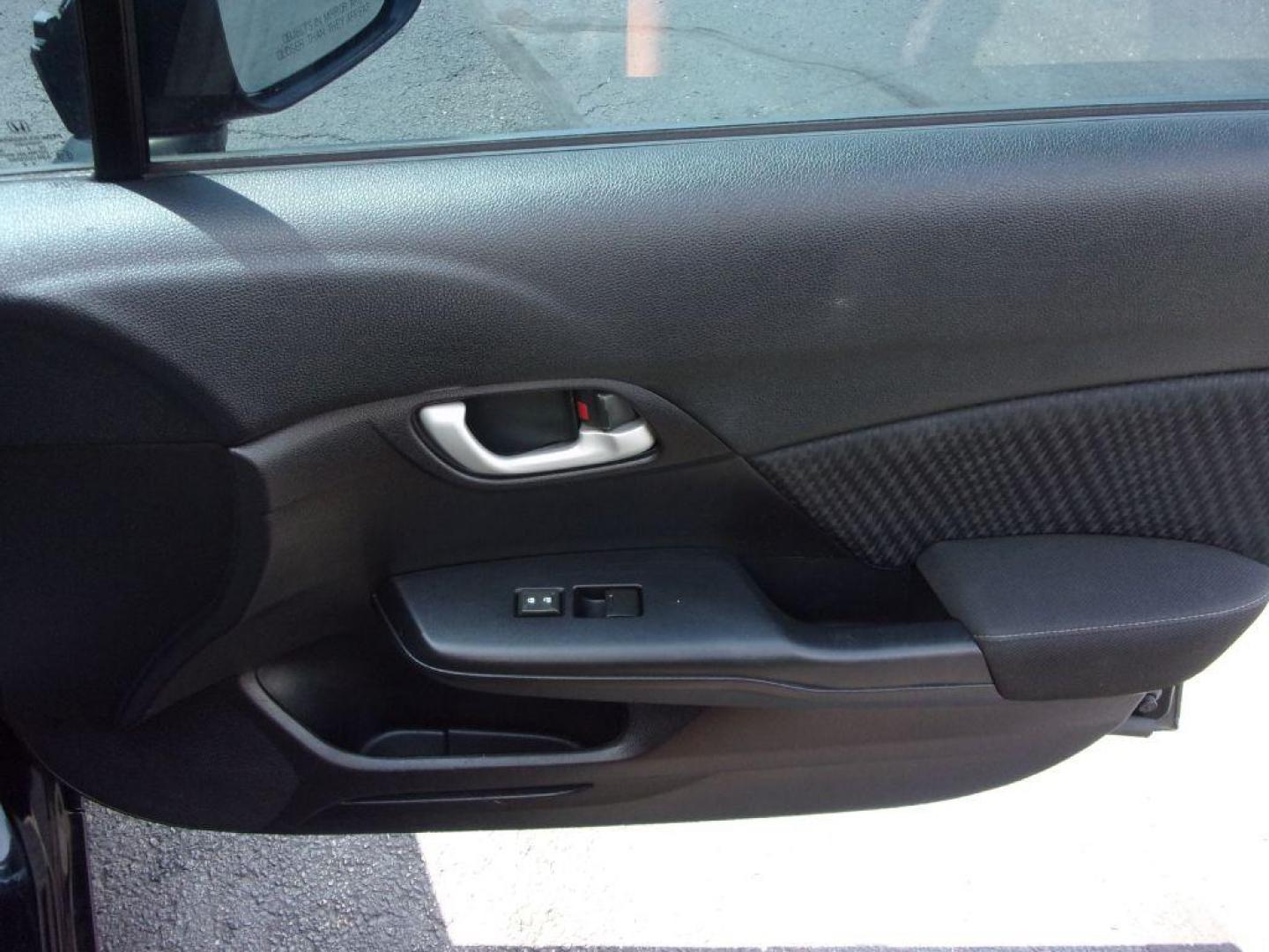 2015 BLACK HONDA CIVIC LX (19XFB2E55FE) with an 1.8L engine, 5-Speed Manual transmission, located at 501 E. Columbia St., Springfield, OH, 45503, (800) 262-7122, 39.925262, -83.801796 - Photo#17
