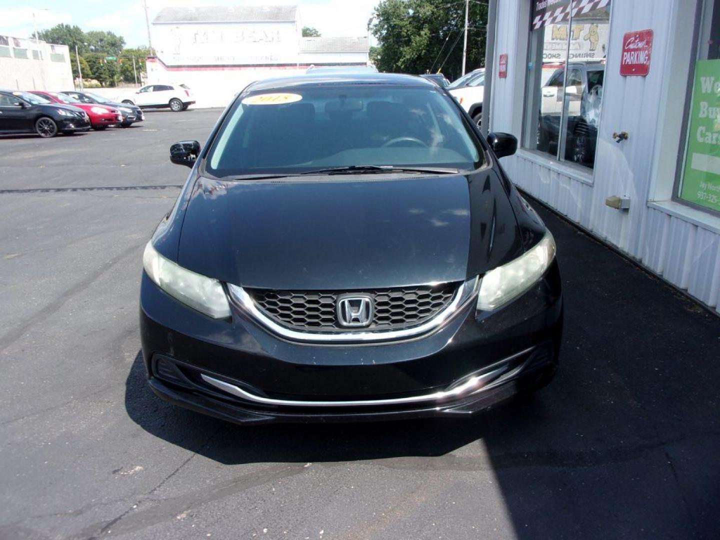 2015 BLACK HONDA CIVIC LX (19XFB2E55FE) with an 1.8L engine, 5-Speed Manual transmission, located at 501 E. Columbia St., Springfield, OH, 45503, (800) 262-7122, 39.925262, -83.801796 - Photo#1