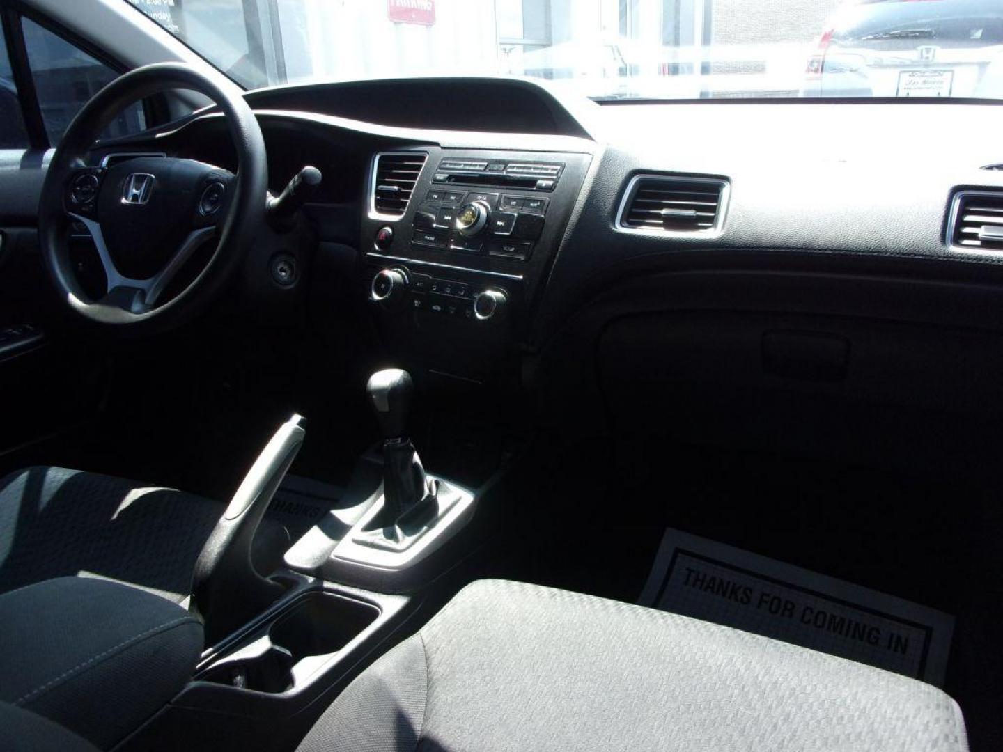 2015 BLACK HONDA CIVIC LX (19XFB2E55FE) with an 1.8L engine, 5-Speed Manual transmission, located at 501 E. Columbia St., Springfield, OH, 45503, (800) 262-7122, 39.925262, -83.801796 - Photo#19
