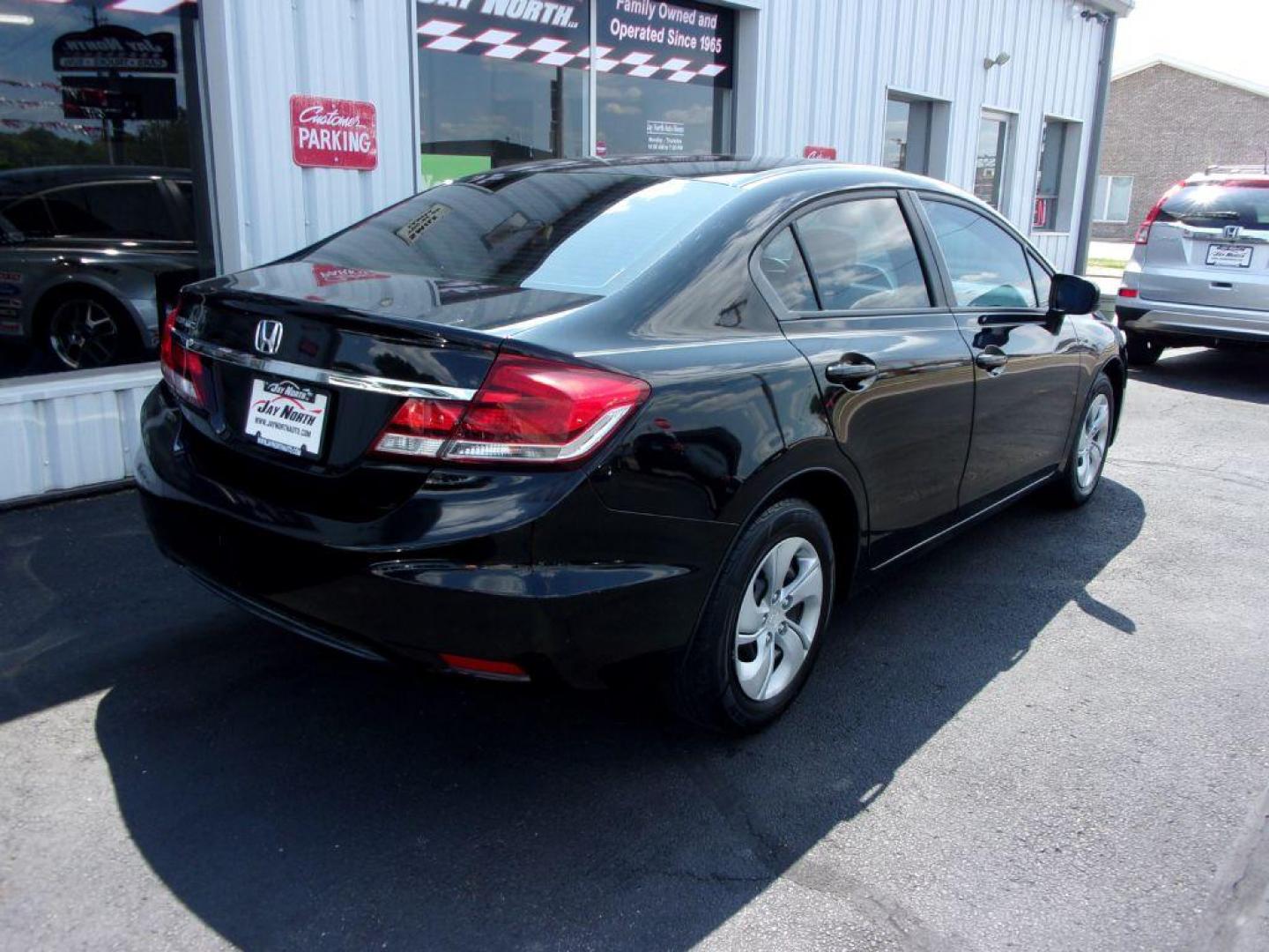 2015 BLACK HONDA CIVIC LX (19XFB2E55FE) with an 1.8L engine, 5-Speed Manual transmission, located at 501 E. Columbia St., Springfield, OH, 45503, (800) 262-7122, 39.925262, -83.801796 - Photo#3