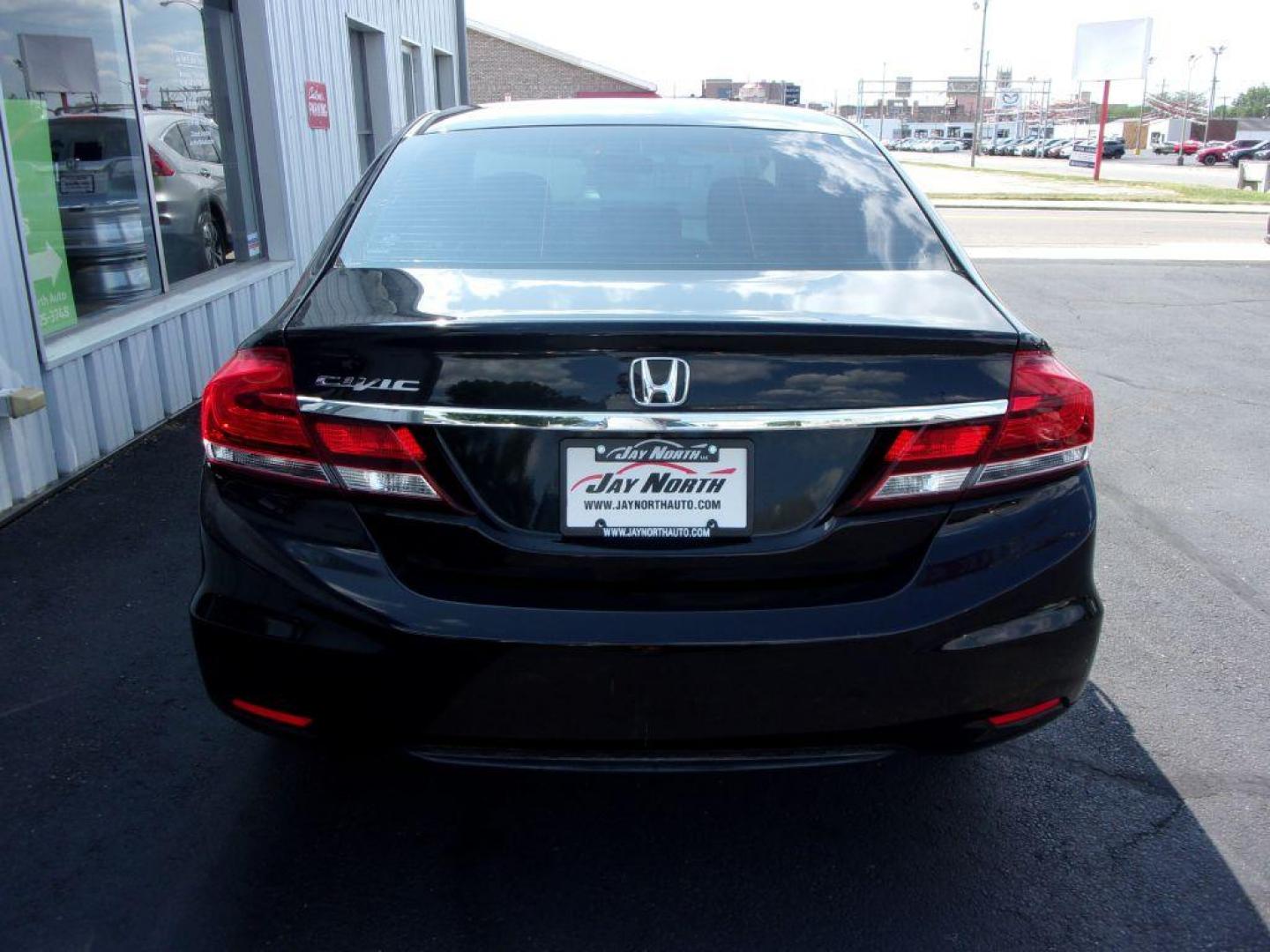 2015 BLACK HONDA CIVIC LX (19XFB2E55FE) with an 1.8L engine, 5-Speed Manual transmission, located at 501 E. Columbia St., Springfield, OH, 45503, (800) 262-7122, 39.925262, -83.801796 - Photo#4