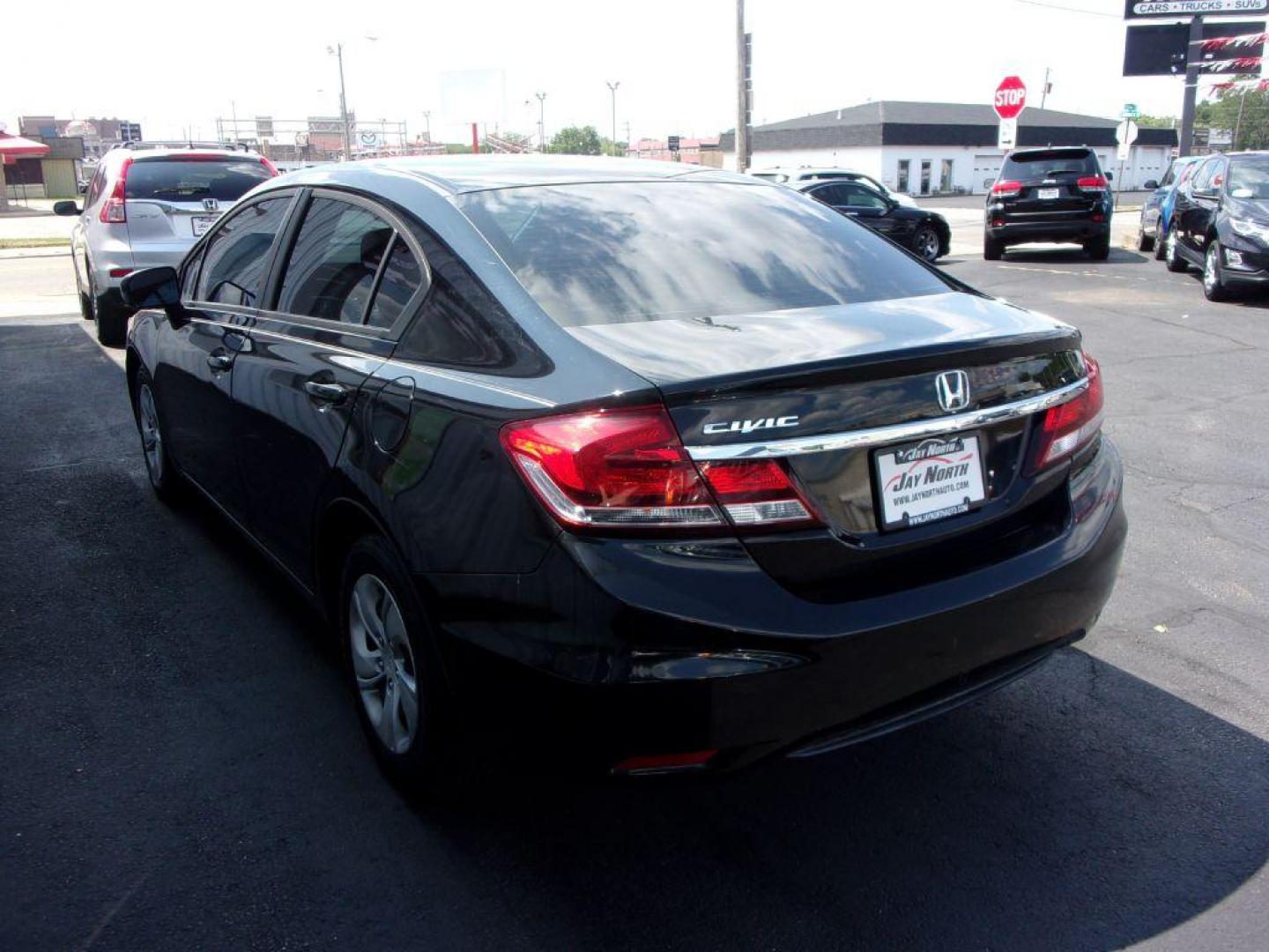 2015 BLACK HONDA CIVIC LX (19XFB2E55FE) with an 1.8L engine, 5-Speed Manual transmission, located at 501 E. Columbia St., Springfield, OH, 45503, (800) 262-7122, 39.925262, -83.801796 - Photo#5