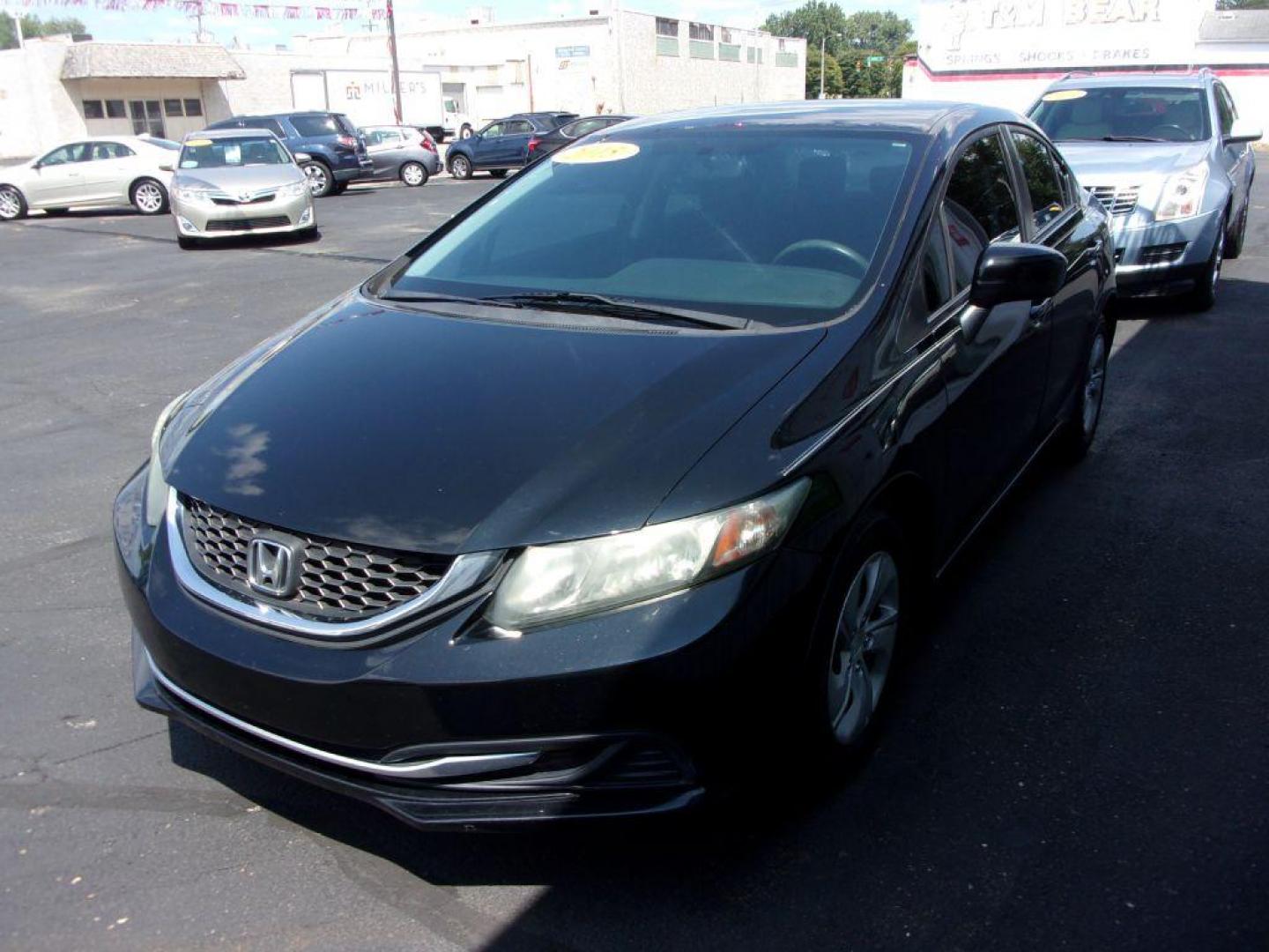 2015 BLACK HONDA CIVIC LX (19XFB2E55FE) with an 1.8L engine, 5-Speed Manual transmission, located at 501 E. Columbia St., Springfield, OH, 45503, (800) 262-7122, 39.925262, -83.801796 - Photo#6
