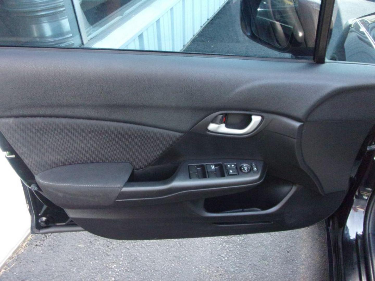 2015 BLACK HONDA CIVIC LX (19XFB2E55FE) with an 1.8L engine, 5-Speed Manual transmission, located at 501 E. Columbia St., Springfield, OH, 45503, (800) 262-7122, 39.925262, -83.801796 - Photo#7
