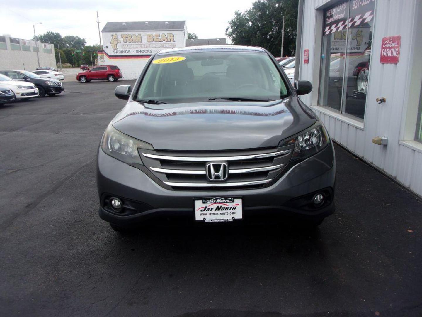 2013 GRAY HONDA CR-V EX (2HKRM4H56DH) with an 2.4L engine, Automatic transmission, located at 501 E. Columbia St., Springfield, OH, 45503, (800) 262-7122, 39.925262, -83.801796 - ***1-Owner***Clean Carfax***AWD***EX***Updated Timing***Serviced and Detailed*** Jay North Auto has offered hand picked vehicles since 1965! Our customer's enjoy a NO pressure buying experience with a small town feel. All of our vehicles get fully inspected and detailed. We are a preferred deale - Photo#1