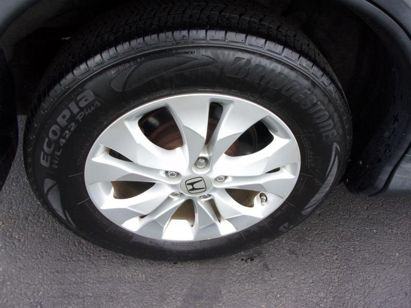 2013 GRAY HONDA CR-V EX (2HKRM4H56DH) with an 2.4L engine, Automatic transmission, located at 501 E. Columbia St., Springfield, OH, 45503, (800) 262-7122, 39.925262, -83.801796 - ***1-Owner***Clean Carfax***AWD***EX***Updated Timing***Serviced and Detailed*** Jay North Auto has offered hand picked vehicles since 1965! Our customer's enjoy a NO pressure buying experience with a small town feel. All of our vehicles get fully inspected and detailed. We are a preferred deale - Photo#20