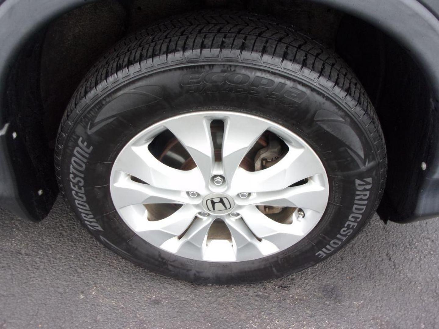 2013 GRAY HONDA CR-V EX (2HKRM4H56DH) with an 2.4L engine, Automatic transmission, located at 501 E. Columbia St., Springfield, OH, 45503, (800) 262-7122, 39.925262, -83.801796 - ***1-Owner***Clean Carfax***AWD***EX***Updated Timing***Serviced and Detailed*** Jay North Auto has offered hand picked vehicles since 1965! Our customer's enjoy a NO pressure buying experience with a small town feel. All of our vehicles get fully inspected and detailed. We are a preferred deale - Photo#21