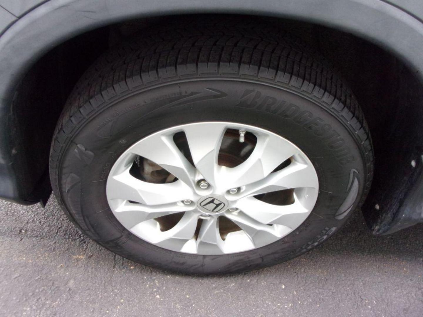 2013 GRAY HONDA CR-V EX (2HKRM4H56DH) with an 2.4L engine, Automatic transmission, located at 501 E. Columbia St., Springfield, OH, 45503, (800) 262-7122, 39.925262, -83.801796 - ***1-Owner***Clean Carfax***AWD***EX***Updated Timing***Serviced and Detailed*** Jay North Auto has offered hand picked vehicles since 1965! Our customer's enjoy a NO pressure buying experience with a small town feel. All of our vehicles get fully inspected and detailed. We are a preferred deale - Photo#22