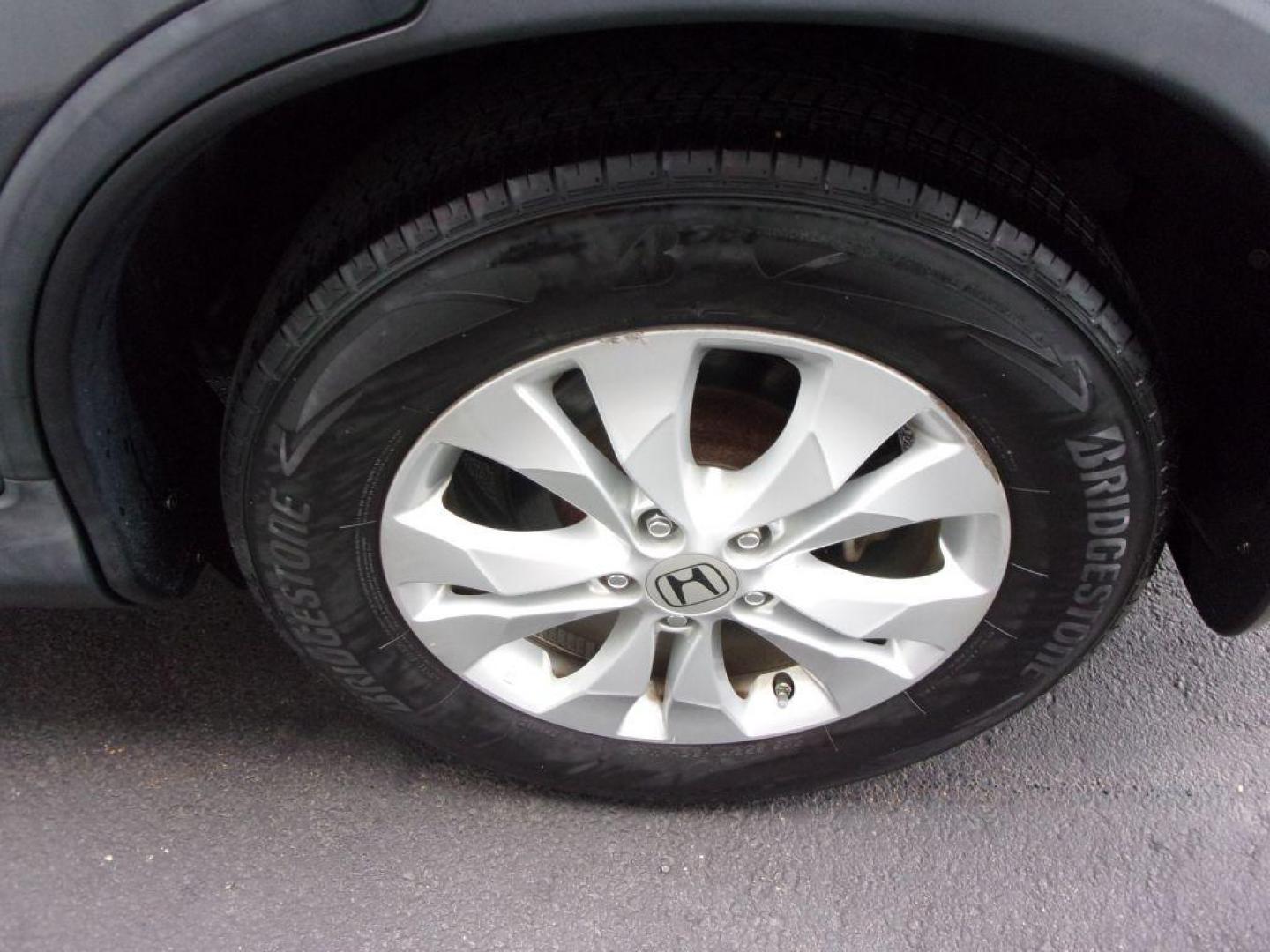 2013 GRAY HONDA CR-V EX (2HKRM4H56DH) with an 2.4L engine, Automatic transmission, located at 501 E. Columbia St., Springfield, OH, 45503, (800) 262-7122, 39.925262, -83.801796 - ***1-Owner***Clean Carfax***AWD***EX***Updated Timing***Serviced and Detailed*** Jay North Auto has offered hand picked vehicles since 1965! Our customer's enjoy a NO pressure buying experience with a small town feel. All of our vehicles get fully inspected and detailed. We are a preferred deale - Photo#23