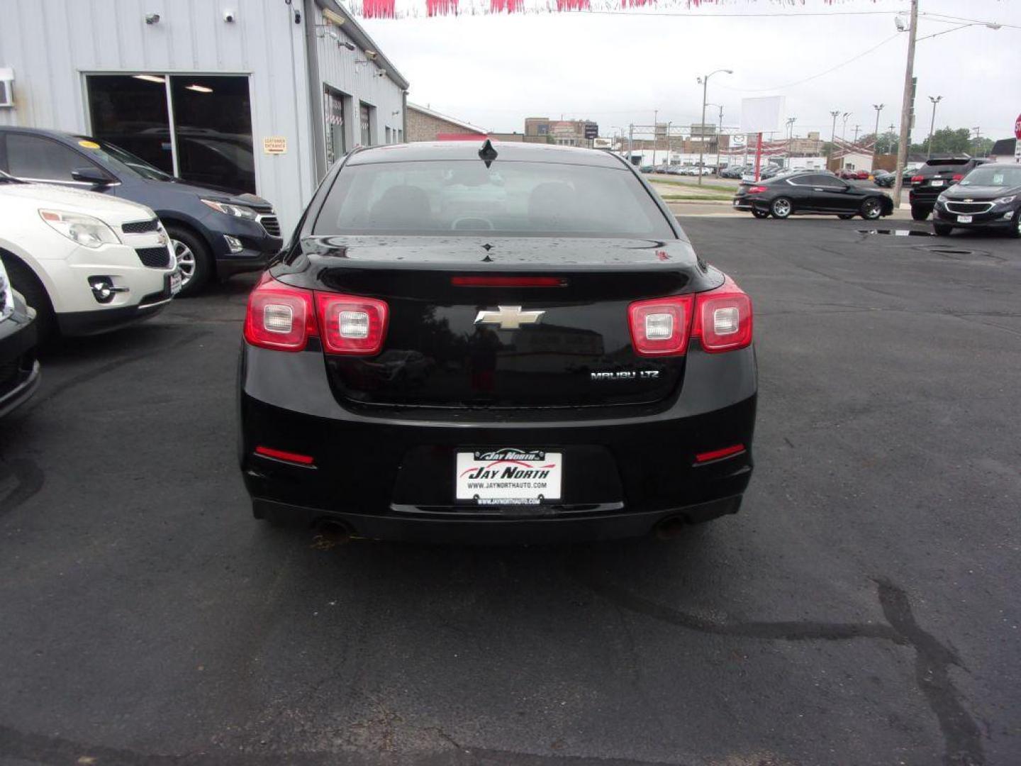 2016 BLACK CHEVROLET MALIBU LIMITED LTZ (1G11E5SA2GU) with an 2.5L engine, Automatic transmission, located at 501 E. Columbia St., Springfield, OH, 45503, (800) 262-7122, 39.925262, -83.801796 - ***Heated Leather Seating***LTZ***Serviced and Detailed*** Jay North Auto has offered hand picked vehicles since 1965! Our customer's enjoy a NO pressure buying experience with a small town feel. All of our vehicles get fully inspected and detailed. We are a preferred dealer for many local credi - Photo#4
