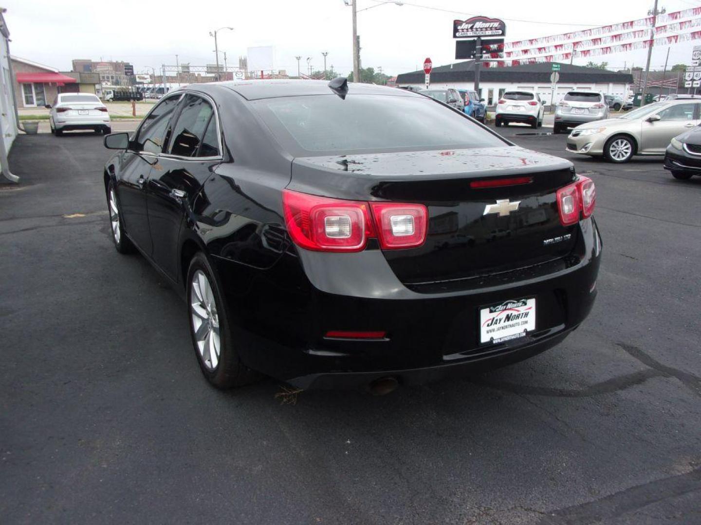 2016 BLACK CHEVROLET MALIBU LIMITED LTZ (1G11E5SA2GU) with an 2.5L engine, Automatic transmission, located at 501 E. Columbia St., Springfield, OH, 45503, (800) 262-7122, 39.925262, -83.801796 - ***Heated Leather Seating***LTZ***Serviced and Detailed*** Jay North Auto has offered hand picked vehicles since 1965! Our customer's enjoy a NO pressure buying experience with a small town feel. All of our vehicles get fully inspected and detailed. We are a preferred dealer for many local credi - Photo#5