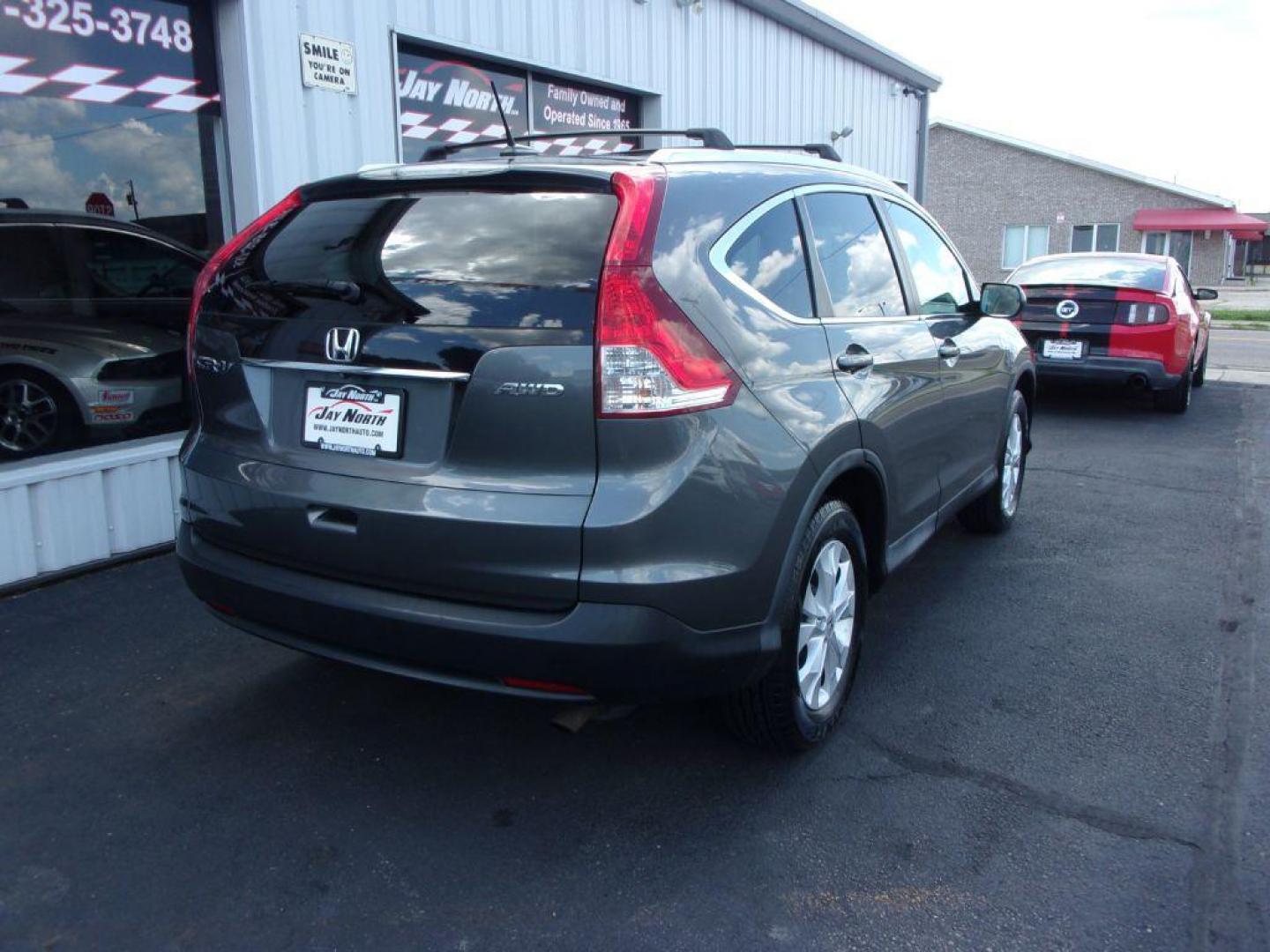 2014 GRAY HONDA CR-V EXL (2HKRM4H78EH) with an 2.4L engine, Automatic transmission, located at 501 E. Columbia St., Springfield, OH, 45503, (800) 262-7122, 39.925262, -83.801796 - Photo#3