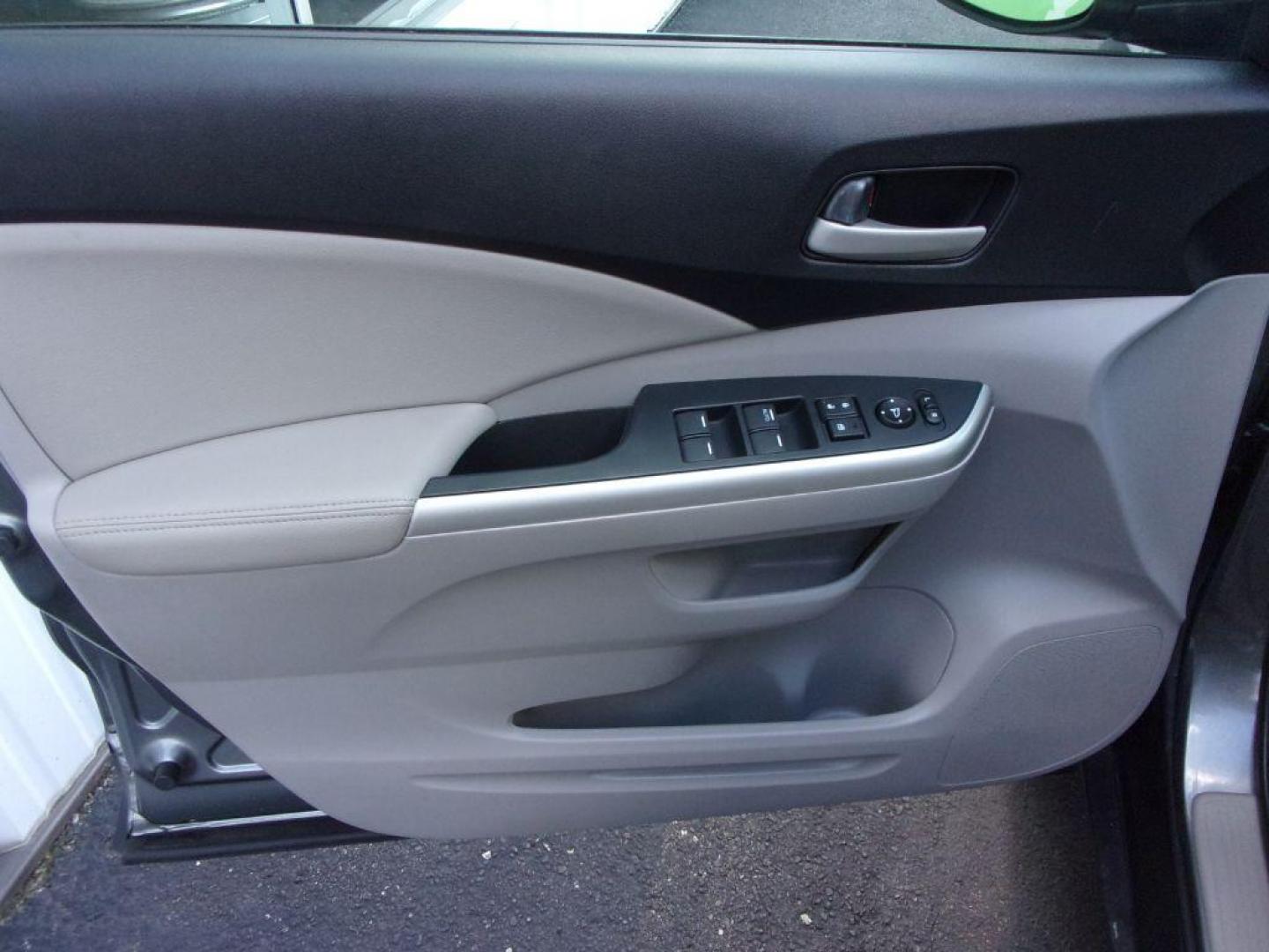 2014 GRAY HONDA CR-V EXL (2HKRM4H78EH) with an 2.4L engine, Automatic transmission, located at 501 E. Columbia St., Springfield, OH, 45503, (800) 262-7122, 39.925262, -83.801796 - Photo#7