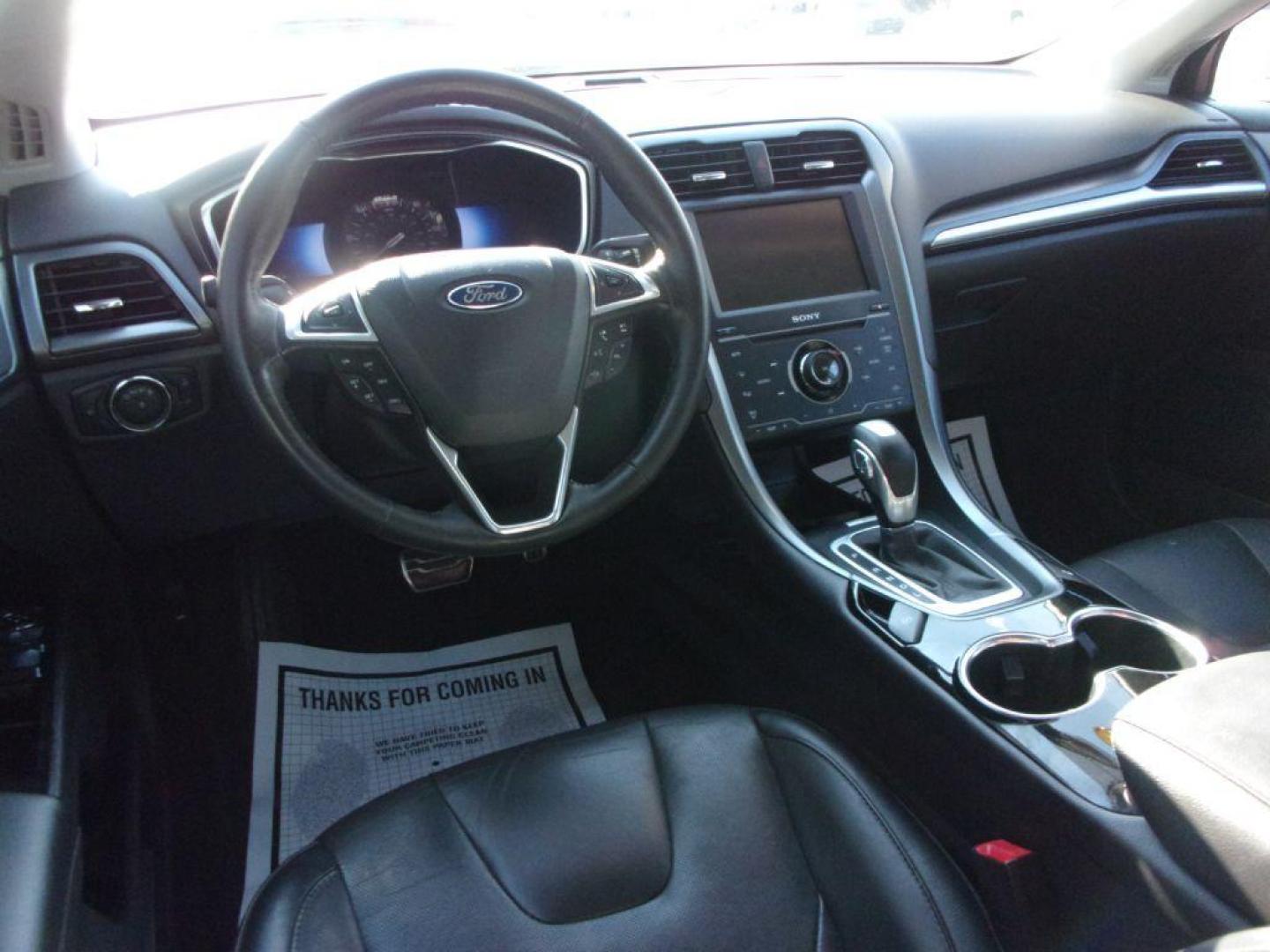 2014 RED FORD FUSION TITANIUM HYBRID (3FA6P0RU3ER) with an 2.0L engine, Continuously Variable transmission, located at 501 E. Columbia St., Springfield, OH, 45503, (800) 262-7122, 39.925262, -83.801796 - ***1-Owner***TITANIUM HYBRID***New Tires***Heated Leather Seating***Back-up Camera***Serviced and Detailed*** Jay North Auto has offered hand picked vehicles since 1965! Our customer's enjoy a NO pressure buying experience with a small town feel. All of our vehicles get fully inspected and detai - Photo#11