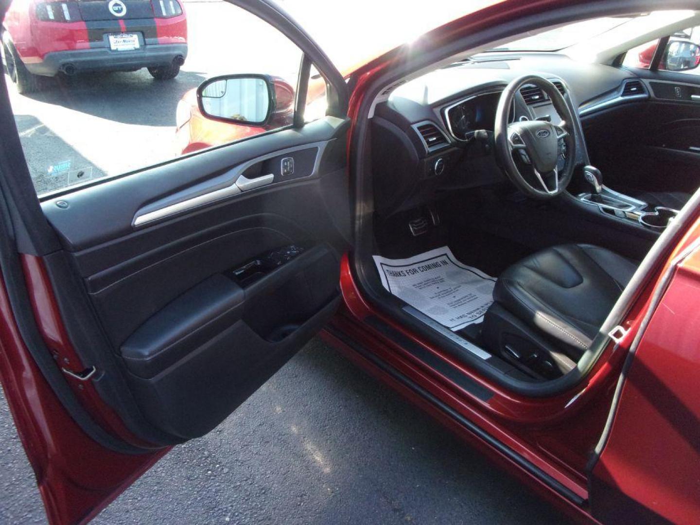 2014 RED FORD FUSION TITANIUM HYBRID (3FA6P0RU3ER) with an 2.0L engine, Continuously Variable transmission, located at 501 E. Columbia St., Springfield, OH, 45503, (800) 262-7122, 39.925262, -83.801796 - ***1-Owner***TITANIUM HYBRID***New Tires***Heated Leather Seating***Back-up Camera***Serviced and Detailed*** Jay North Auto has offered hand picked vehicles since 1965! Our customer's enjoy a NO pressure buying experience with a small town feel. All of our vehicles get fully inspected and detai - Photo#12