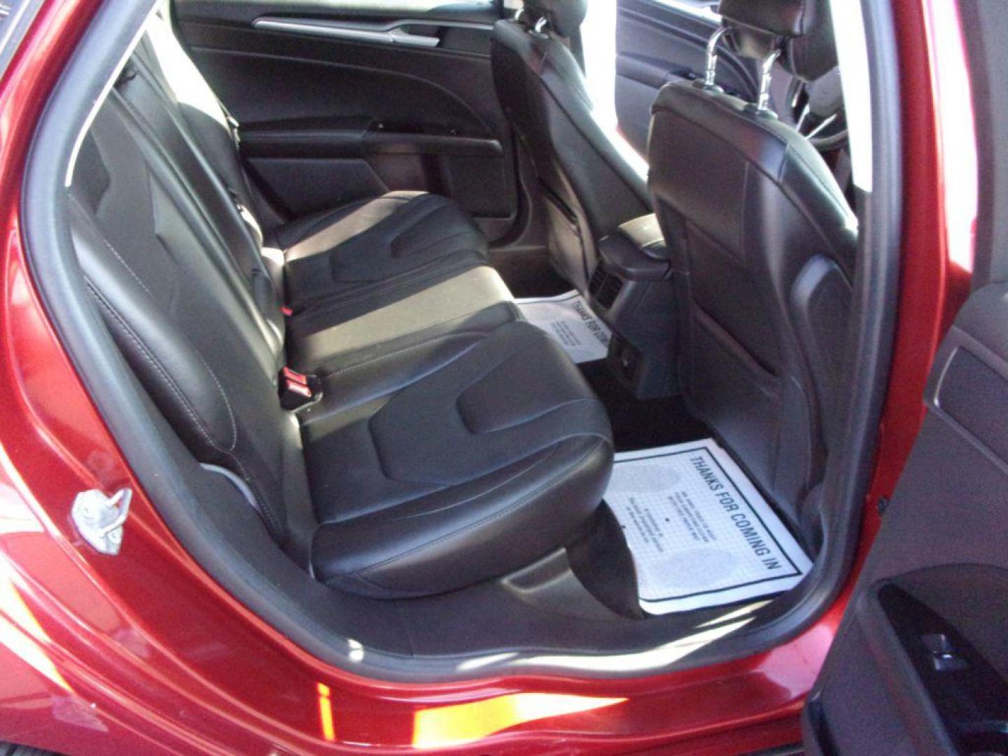 2014 RED FORD FUSION TITANIUM HYBRID (3FA6P0RU3ER) with an 2.0L engine, Continuously Variable transmission, located at 501 E. Columbia St., Springfield, OH, 45503, (800) 262-7122, 39.925262, -83.801796 - ***1-Owner***TITANIUM HYBRID***New Tires***Heated Leather Seating***Back-up Camera***Serviced and Detailed*** Jay North Auto has offered hand picked vehicles since 1965! Our customer's enjoy a NO pressure buying experience with a small town feel. All of our vehicles get fully inspected and detai - Photo#15