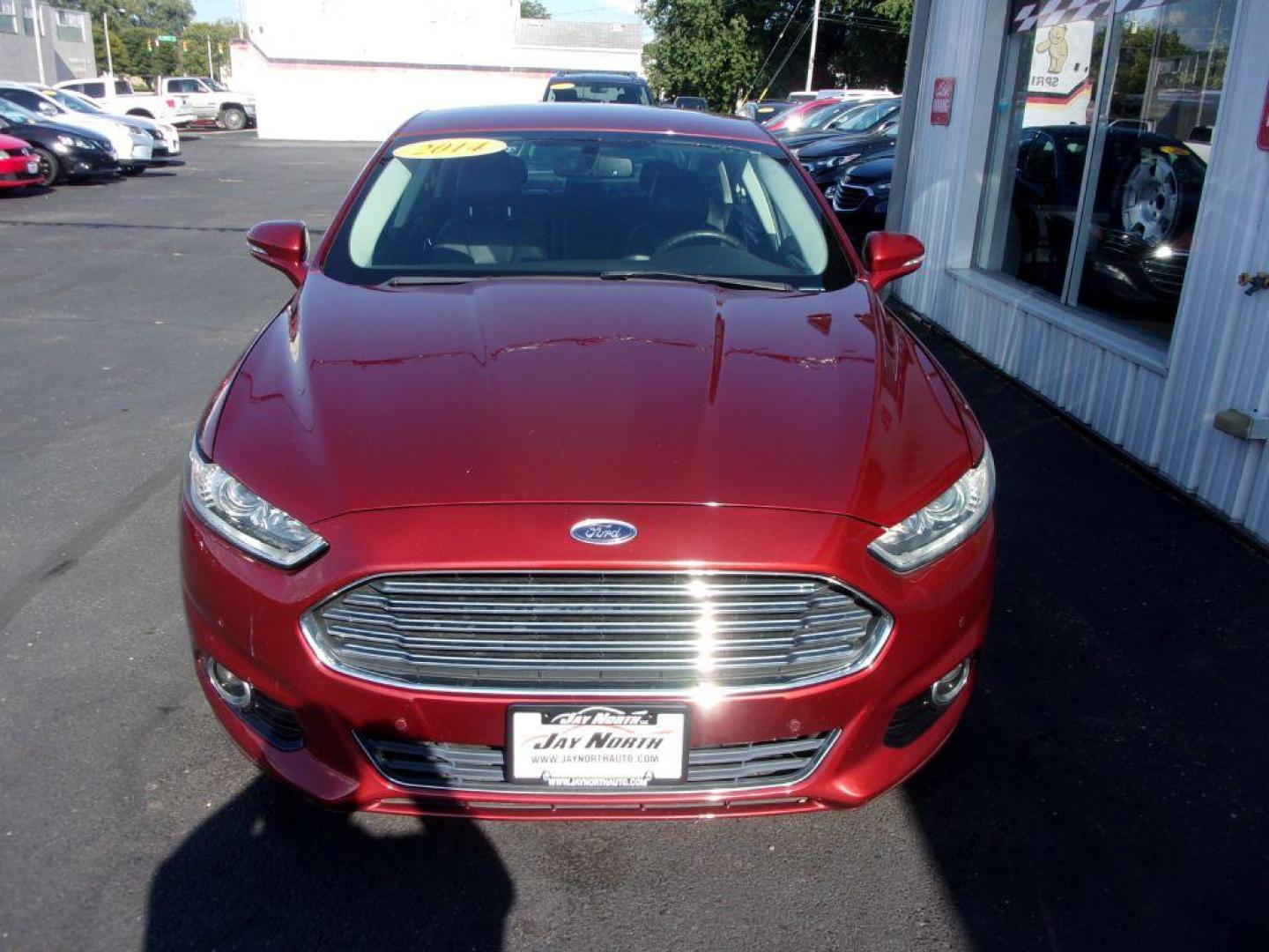 2014 RED FORD FUSION TITANIUM HYBRID (3FA6P0RU3ER) with an 2.0L engine, Continuously Variable transmission, located at 501 E. Columbia St., Springfield, OH, 45503, (800) 262-7122, 39.925262, -83.801796 - ***1-Owner***TITANIUM HYBRID***New Tires***Heated Leather Seating***Back-up Camera***Serviced and Detailed*** Jay North Auto has offered hand picked vehicles since 1965! Our customer's enjoy a NO pressure buying experience with a small town feel. All of our vehicles get fully inspected and detai - Photo#3