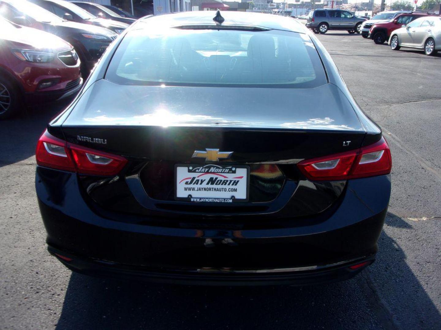 2018 BLACK CHEVROLET MALIBU LT (1G1ZD5ST1JF) with an 1.5L engine, Automatic transmission, located at 501 E. Columbia St., Springfield, OH, 45503, (800) 262-7122, 39.925262, -83.801796 - Photo#6