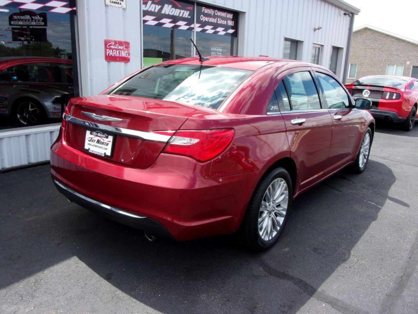 2012 RED CHRYSLER 200 LIMITED (1C3CCBCG1CN) with an 3.6L engine, Automatic transmission, located at 501 E. Columbia St., Springfield, OH, 45503, (800) 262-7122, 39.925262, -83.801796 - Photo#1