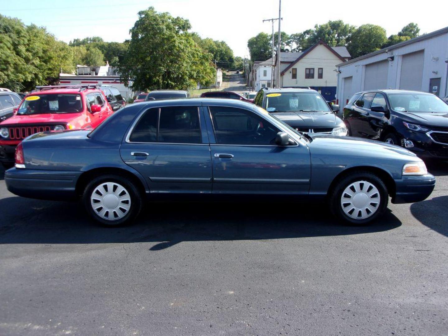 2010 BLUE FORD CROWN VICTORIA POLICE INTERCEPTOR (2FABP7BV1AX) with an 4.6L engine, Automatic transmission, located at 501 E. Columbia St., Springfield, OH, 45503, (800) 262-7122, 39.925262, -83.801796 - Photo#0