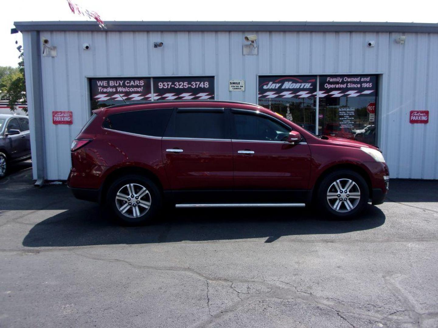 2015 RED CHEVROLET TRAVERSE LT (1GNKVGKDXFJ) with an 3.6L engine, Automatic transmission, located at 501 E. Columbia St., Springfield, OH, 45503, (800) 262-7122, 39.925262, -83.801796 - ***Clean Carfax***Heated Seats***Back-up Camera***46 Service Records on Carfax***3rd Row***Serviced and Detailed*** Jay North Auto has offered hand picked vehicles since 1965! Our customer's enjoy a NO pressure buying experience with a small town feel. All of our vehicles get fully inspected and - Photo#0