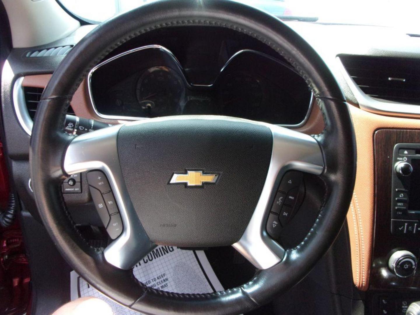 2015 RED CHEVROLET TRAVERSE LT (1GNKVGKDXFJ) with an 3.6L engine, Automatic transmission, located at 501 E. Columbia St., Springfield, OH, 45503, (800) 262-7122, 39.925262, -83.801796 - ***Clean Carfax***Heated Seats***Back-up Camera***46 Service Records on Carfax***3rd Row***Serviced and Detailed*** Jay North Auto has offered hand picked vehicles since 1965! Our customer's enjoy a NO pressure buying experience with a small town feel. All of our vehicles get fully inspected and - Photo#9