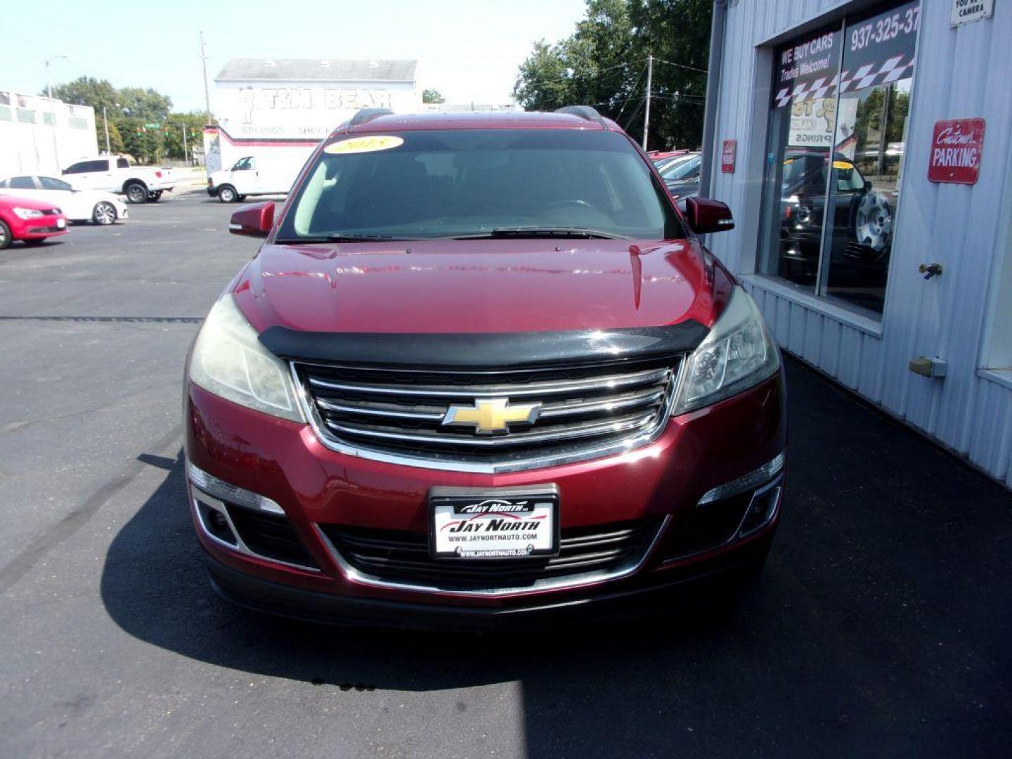 2015 RED CHEVROLET TRAVERSE LT (1GNKVGKDXFJ) with an 3.6L engine, Automatic transmission, located at 501 E. Columbia St., Springfield, OH, 45503, (800) 262-7122, 39.925262, -83.801796 - ***Clean Carfax***Heated Seats***Back-up Camera***46 Service Records on Carfax***3rd Row***Serviced and Detailed*** Jay North Auto has offered hand picked vehicles since 1965! Our customer's enjoy a NO pressure buying experience with a small town feel. All of our vehicles get fully inspected and - Photo#1