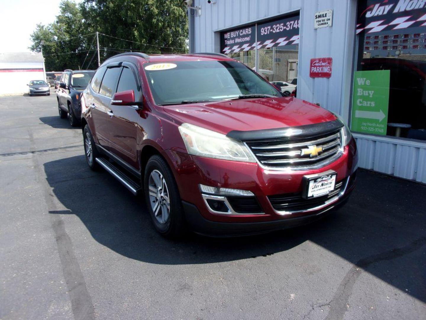 2015 RED CHEVROLET TRAVERSE LT (1GNKVGKDXFJ) with an 3.6L engine, Automatic transmission, located at 501 E. Columbia St., Springfield, OH, 45503, (800) 262-7122, 39.925262, -83.801796 - ***Clean Carfax***Heated Seats***Back-up Camera***46 Service Records on Carfax***3rd Row***Serviced and Detailed*** Jay North Auto has offered hand picked vehicles since 1965! Our customer's enjoy a NO pressure buying experience with a small town feel. All of our vehicles get fully inspected and - Photo#2