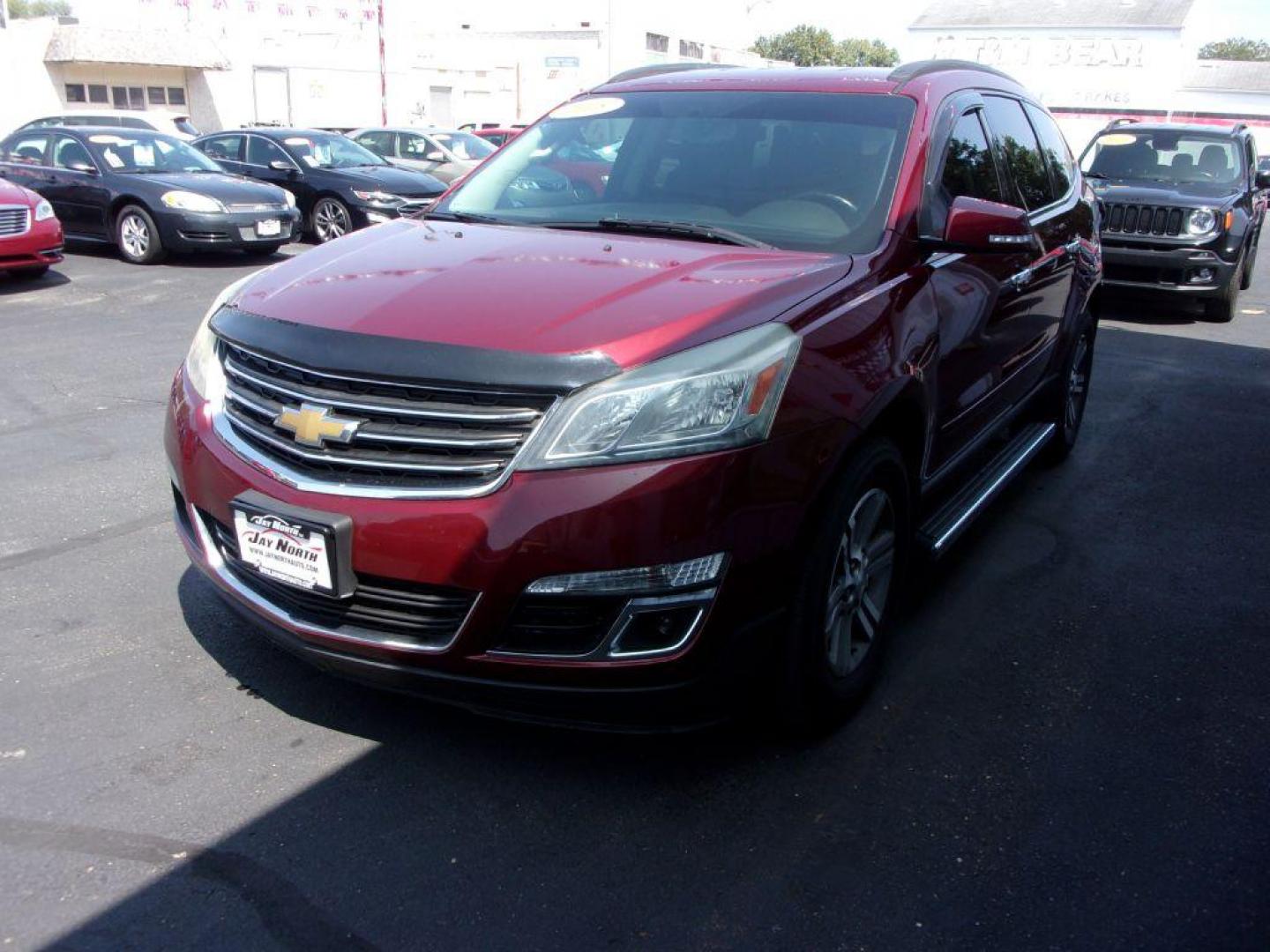 2015 RED CHEVROLET TRAVERSE LT (1GNKVGKDXFJ) with an 3.6L engine, Automatic transmission, located at 501 E. Columbia St., Springfield, OH, 45503, (800) 262-7122, 39.925262, -83.801796 - ***Clean Carfax***Heated Seats***Back-up Camera***46 Service Records on Carfax***3rd Row***Serviced and Detailed*** Jay North Auto has offered hand picked vehicles since 1965! Our customer's enjoy a NO pressure buying experience with a small town feel. All of our vehicles get fully inspected and - Photo#6