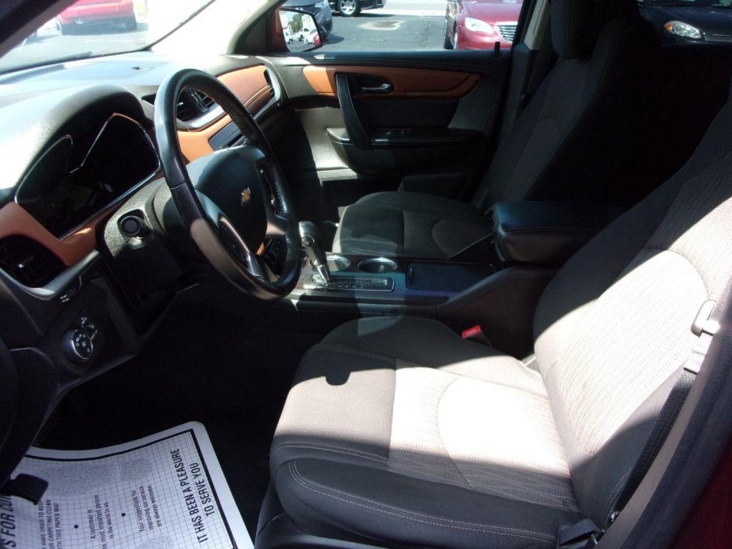 2015 RED CHEVROLET TRAVERSE LT (1GNKVGKDXFJ) with an 3.6L engine, Automatic transmission, located at 501 E. Columbia St., Springfield, OH, 45503, (800) 262-7122, 39.925262, -83.801796 - ***Clean Carfax***Heated Seats***Back-up Camera***46 Service Records on Carfax***3rd Row***Serviced and Detailed*** Jay North Auto has offered hand picked vehicles since 1965! Our customer's enjoy a NO pressure buying experience with a small town feel. All of our vehicles get fully inspected and - Photo#8