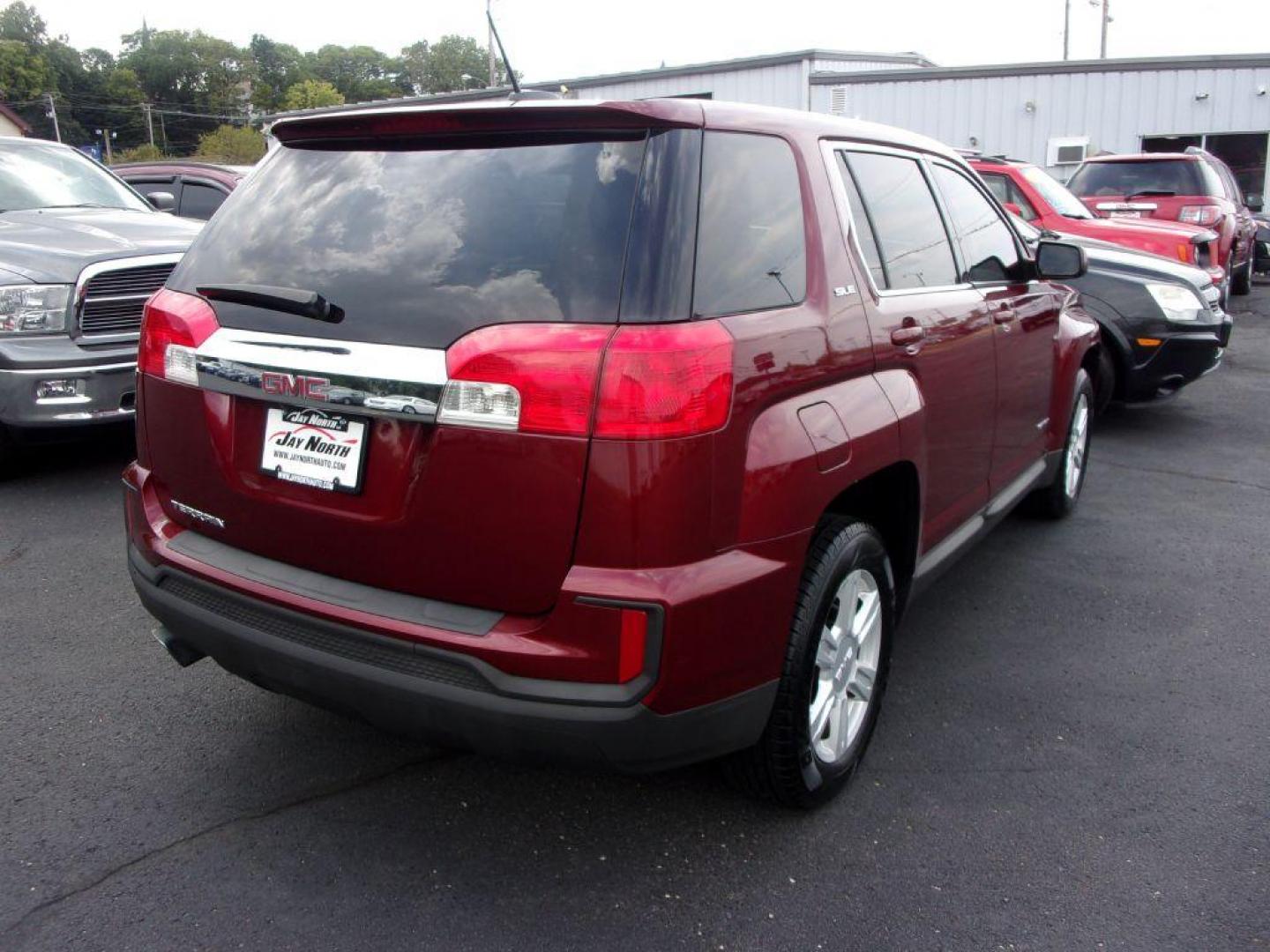 2016 RED GMC TERRAIN SLE (2GKALMEK5G6) with an 2.4L engine, Automatic transmission, located at 501 E. Columbia St., Springfield, OH, 45503, (800) 262-7122, 39.925262, -83.801796 - ***SLE***New Tires***Back-up Camera***Serviced and Detailed*** Jay North Auto has offered hand picked vehicles since 1965! Our customer's enjoy a NO pressure buying experience with a small town feel. All of our vehicles get fully inspected and detailed. We are a preferred dealer for many local c - Photo#2