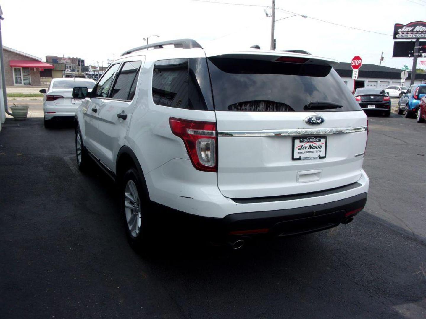 2015 WHITE FORD EXPLORER (1FM5K7B82FG) with an 3.5L engine, Automatic transmission, located at 501 E. Columbia St., Springfield, OH, 45503, (800) 262-7122, 39.925262, -83.801796 - Photo#5